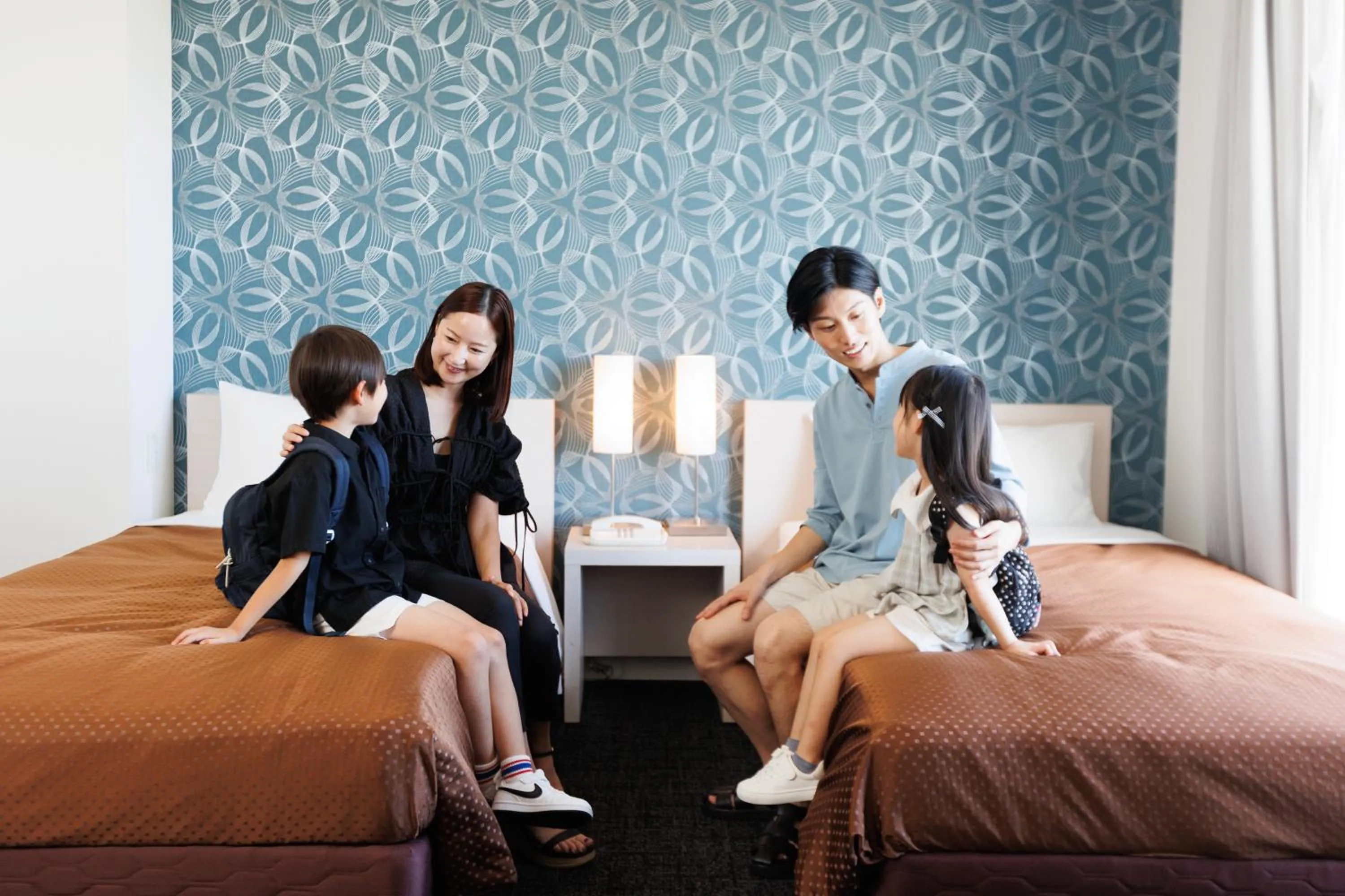 Bed in J Hotel Rinku