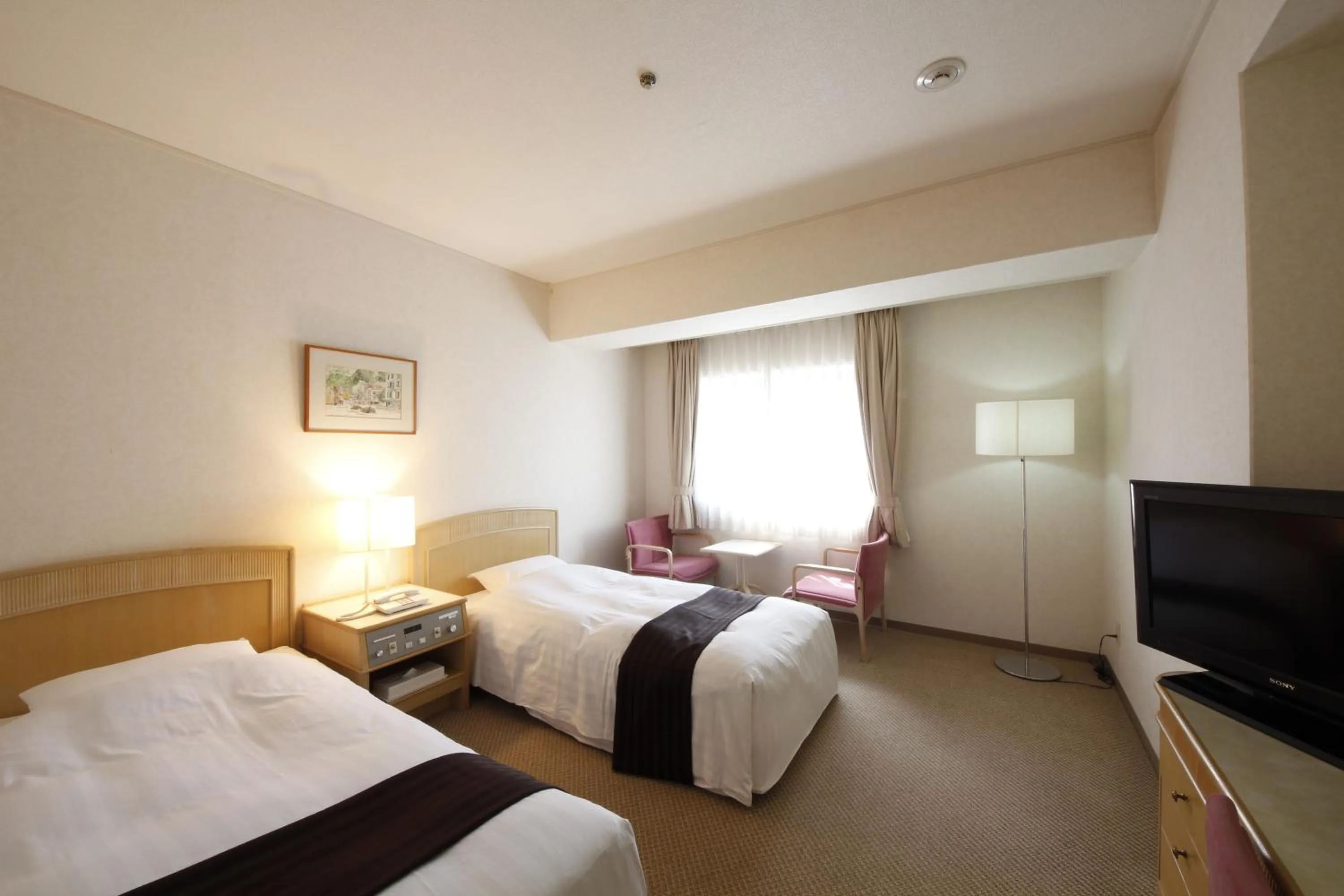 Photo of the whole room, Bed in Hotel Hiroshima Garden Palace