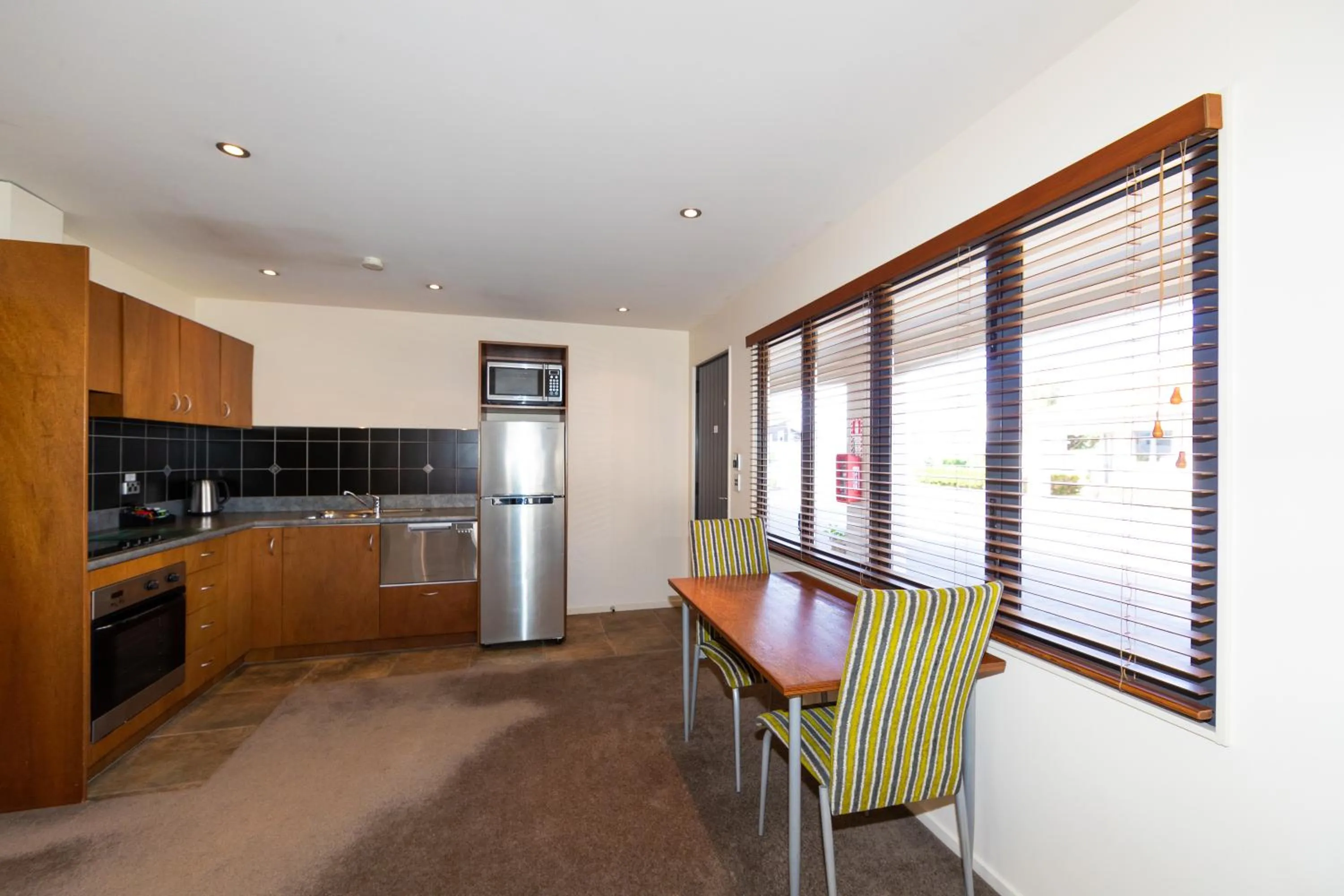 Kitchen or kitchenette in Harvest Lodge Motel