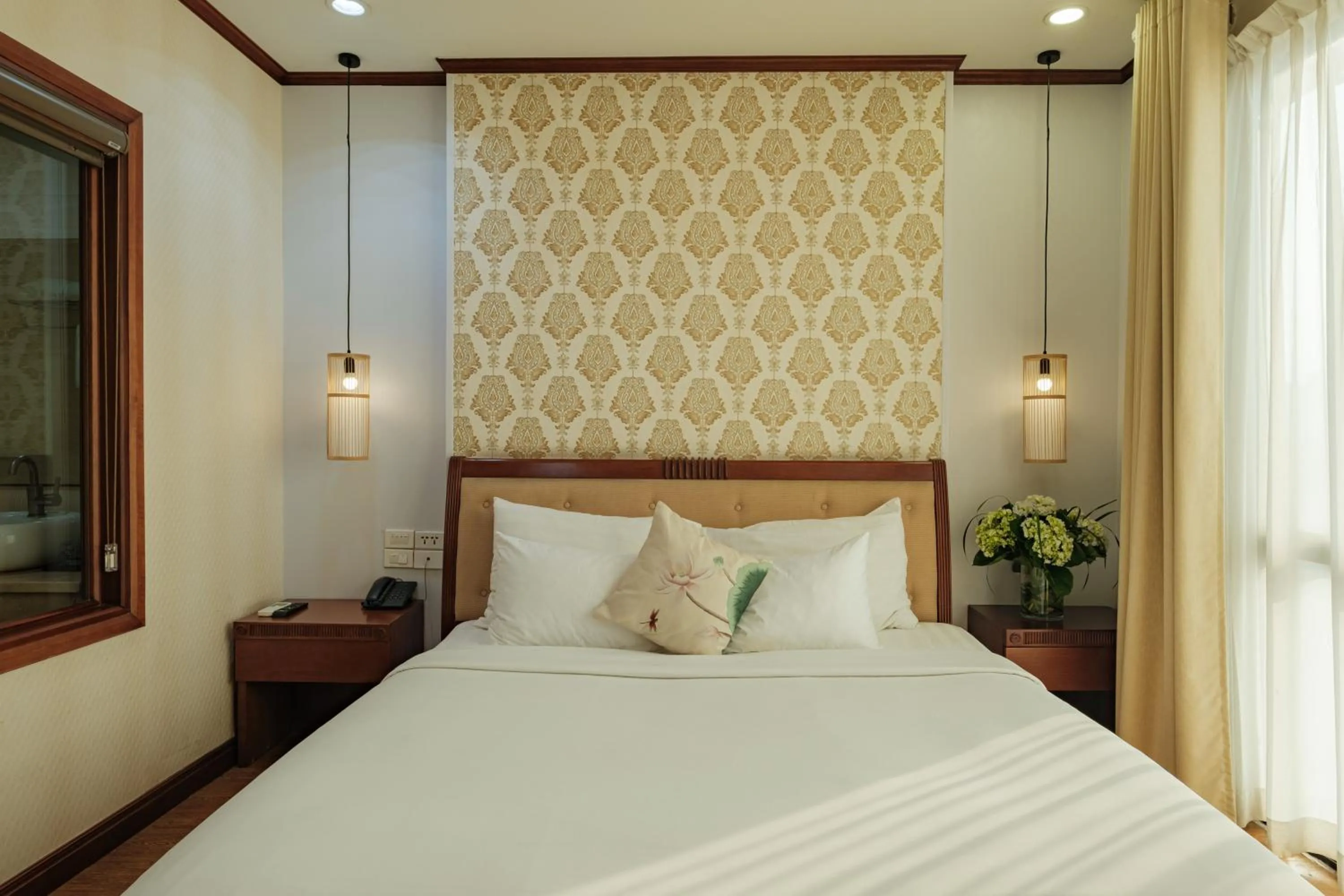 Bed in Sunset Westlake Hanoi Hotel