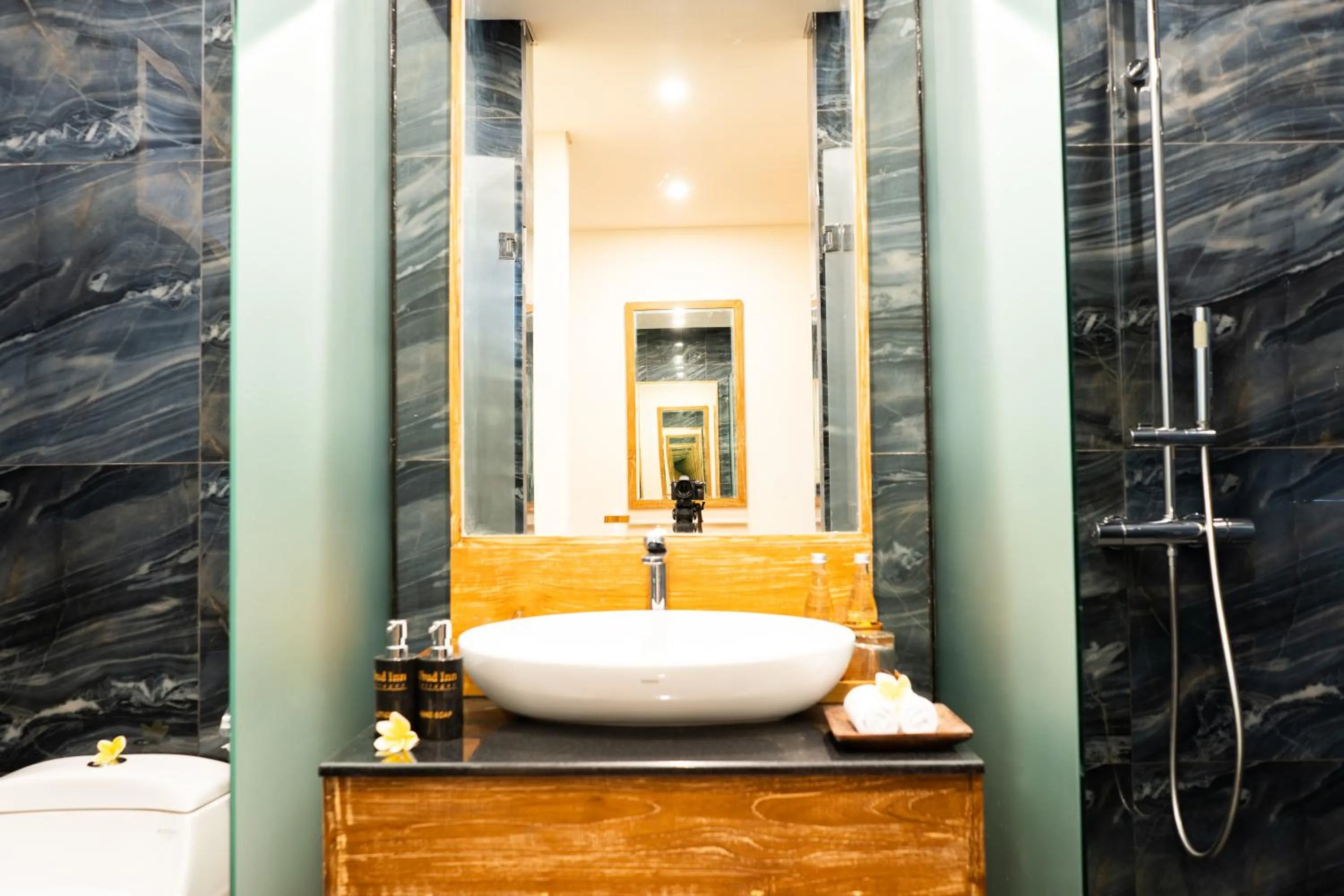 Bathroom in Ubud Inn Cottage by Prasi