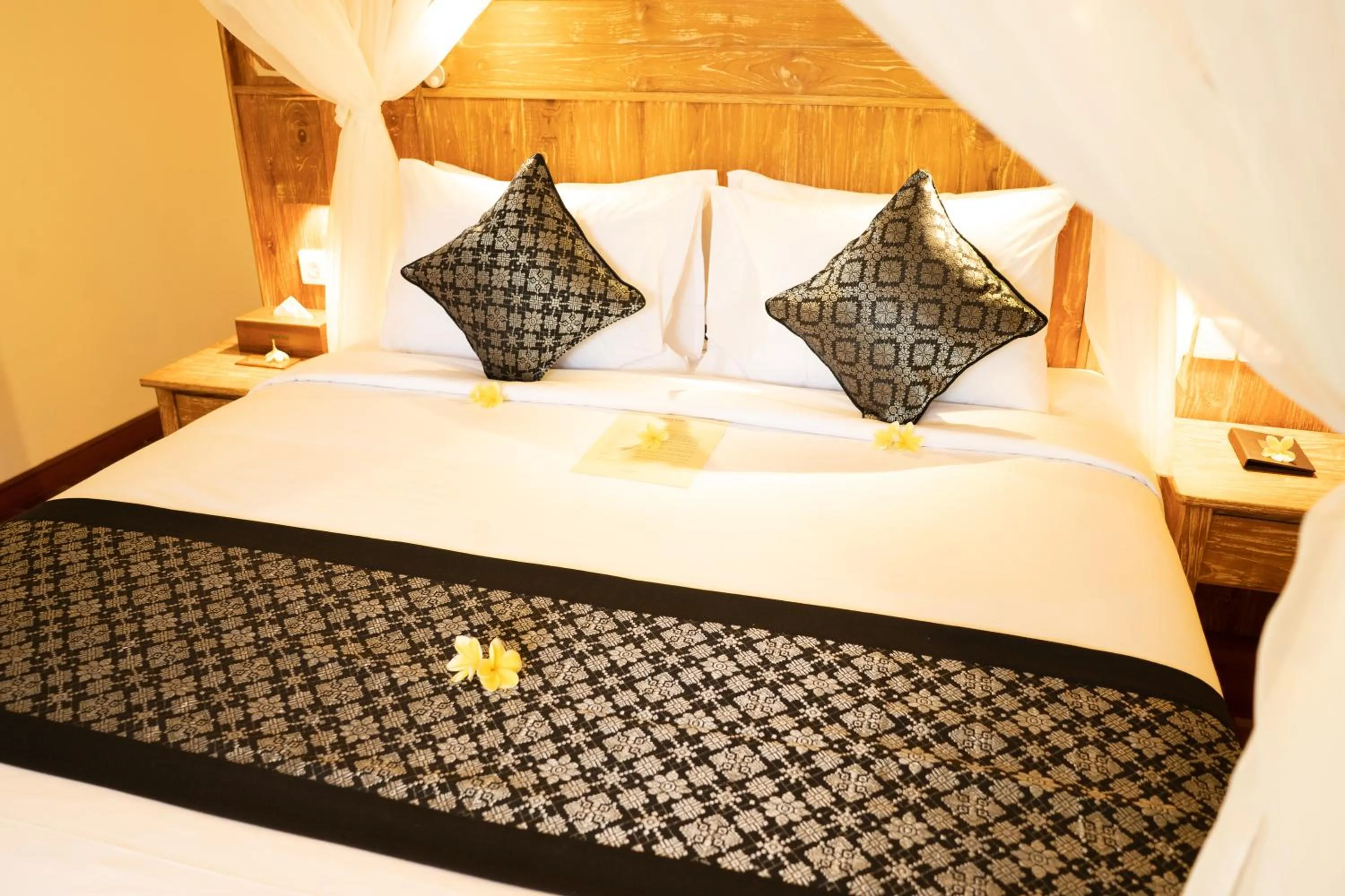 Bed in Ubud Inn Cottage by Prasi