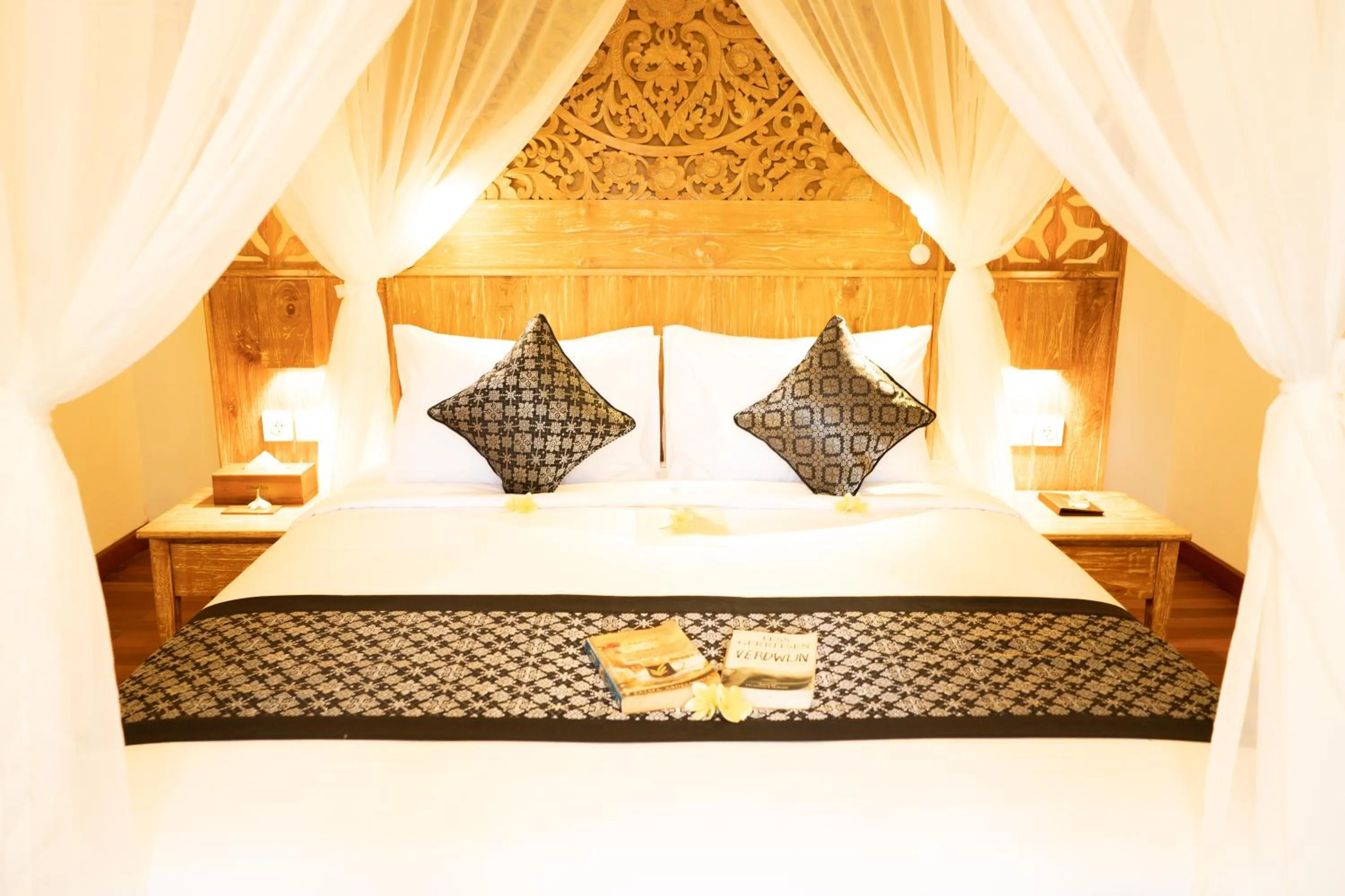 Bed in Ubud Inn Cottage by Prasi