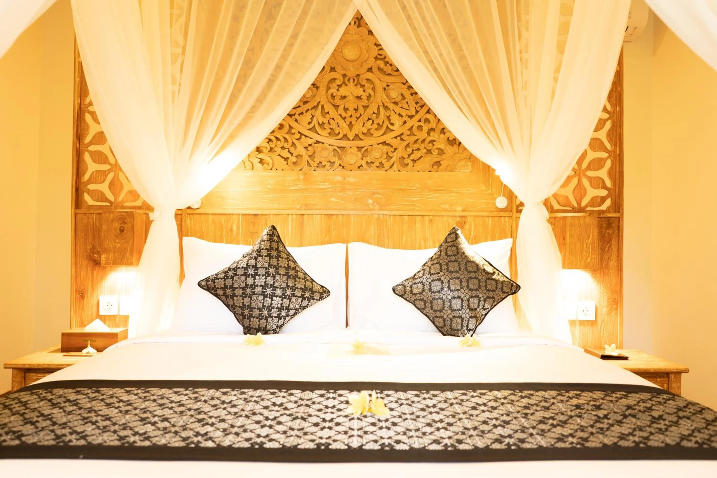 Bed in Ubud Inn Cottage by Prasi