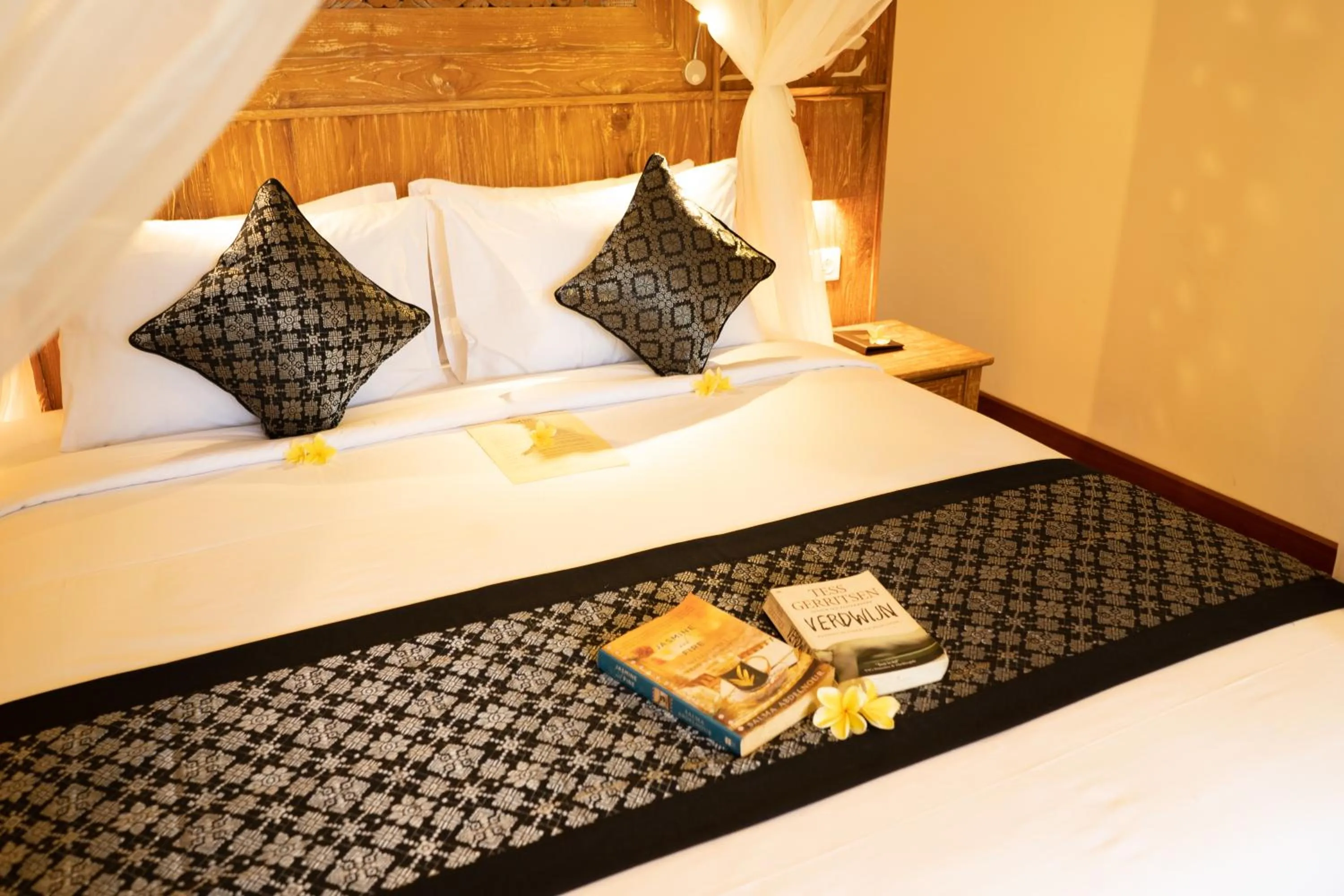 Bed in Ubud Inn Cottage by Prasi