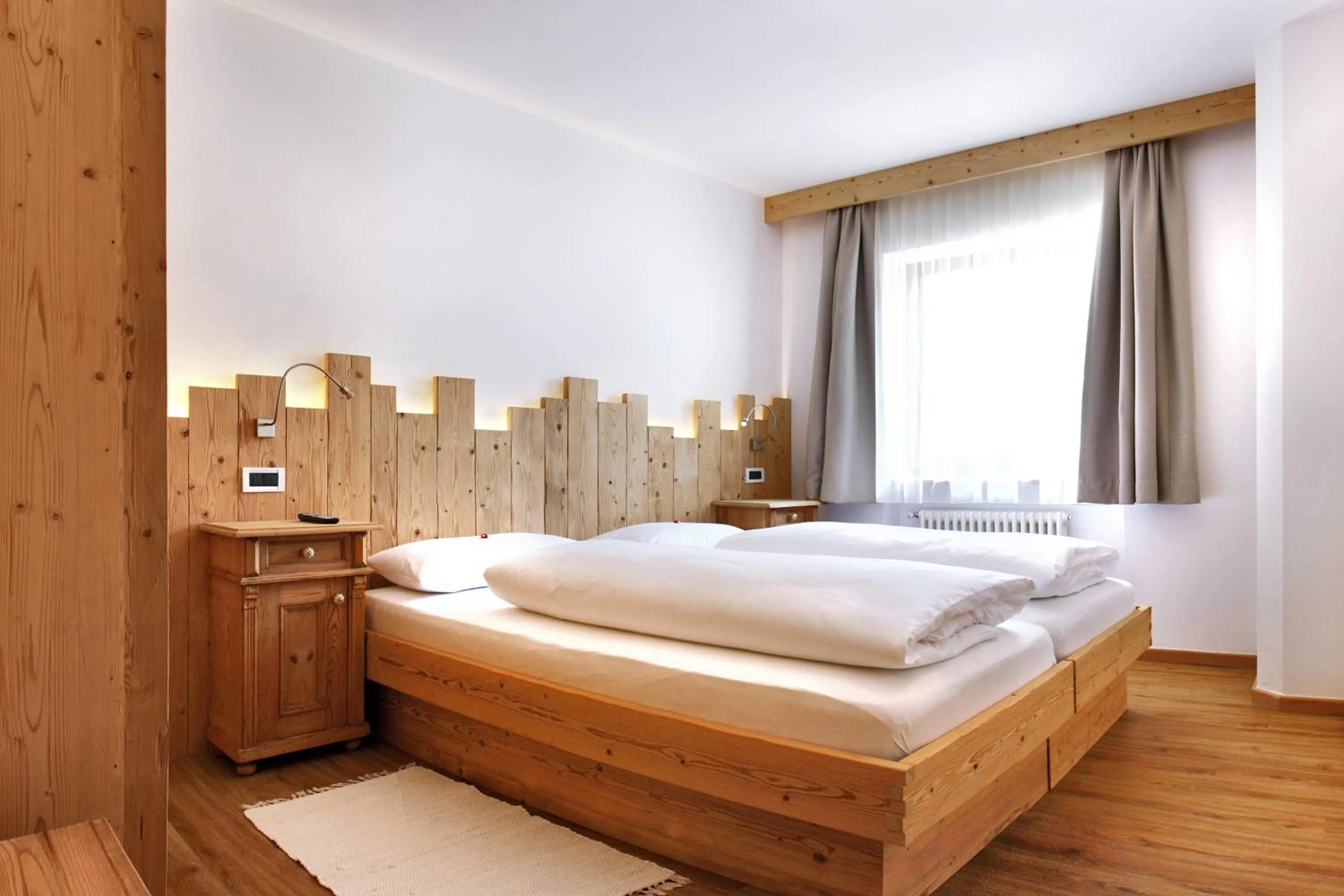 Bedroom, Bed in La Bercia Alpine Lodge & Spa