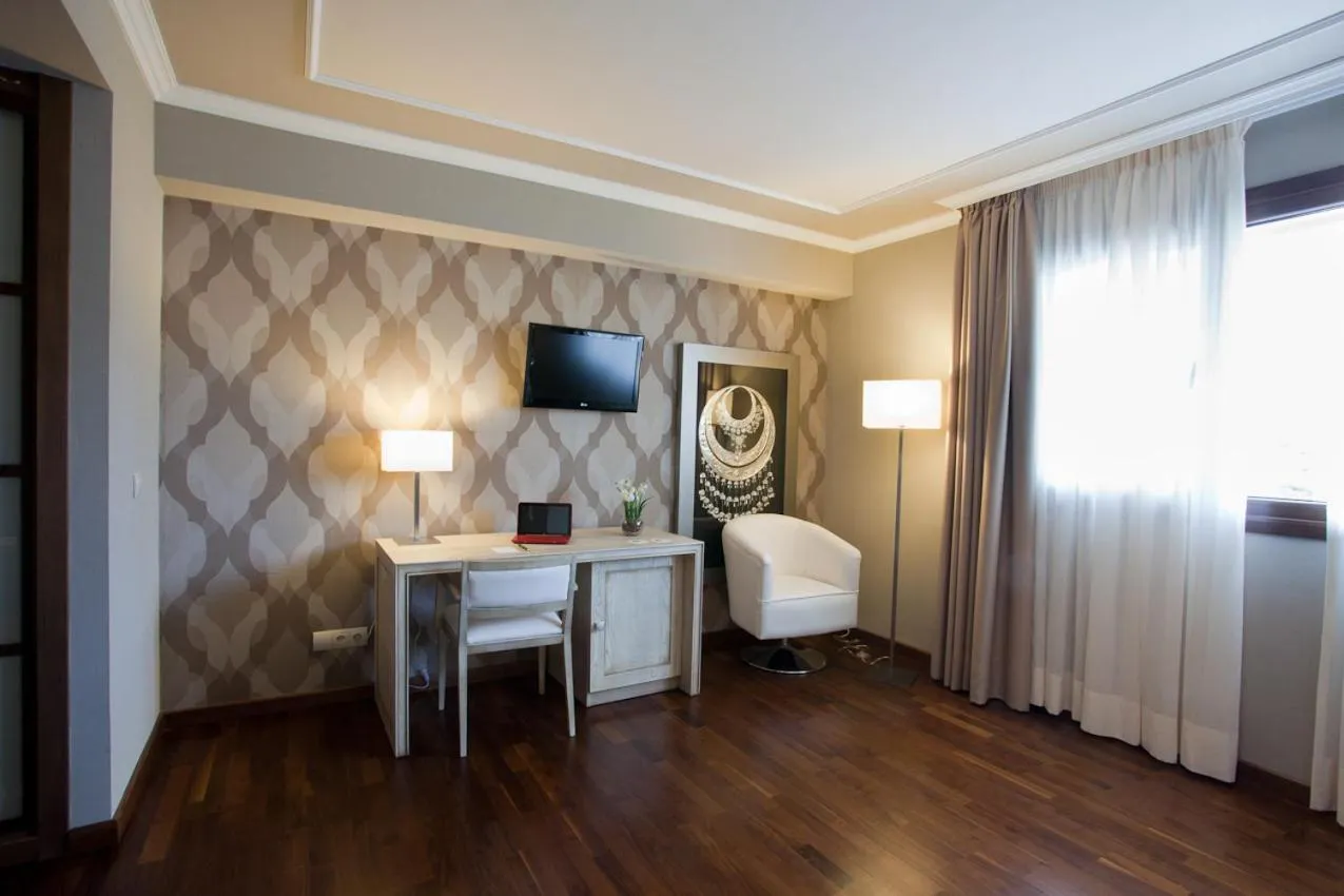 Seating area, Bed in Hotel Os Olivos