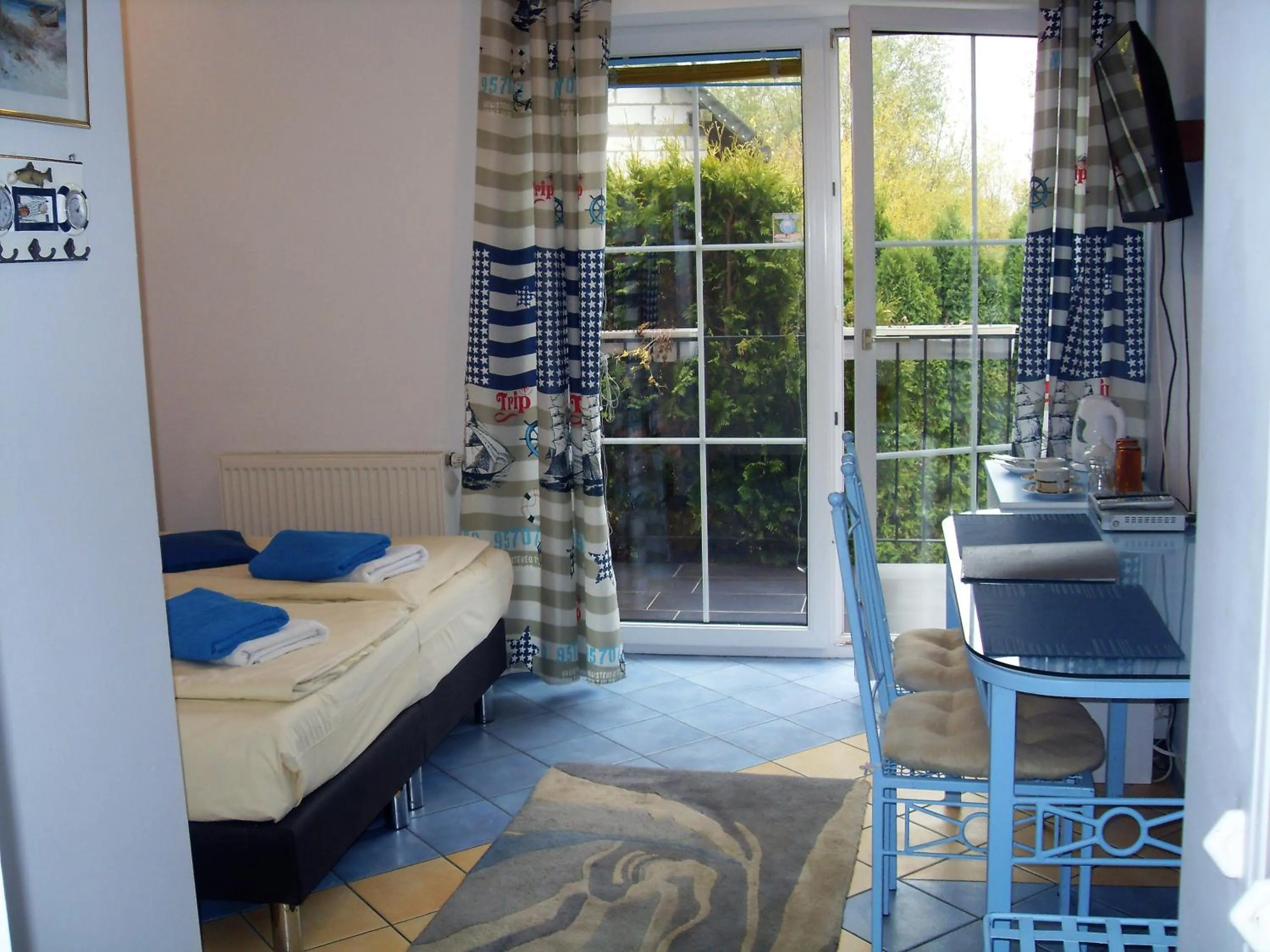 Photo of the whole room in Willa Cyklada, grill, śniadania, jezioro,przystań,tawerna-200m, park linowy-400m, centrum,aquapark-900m