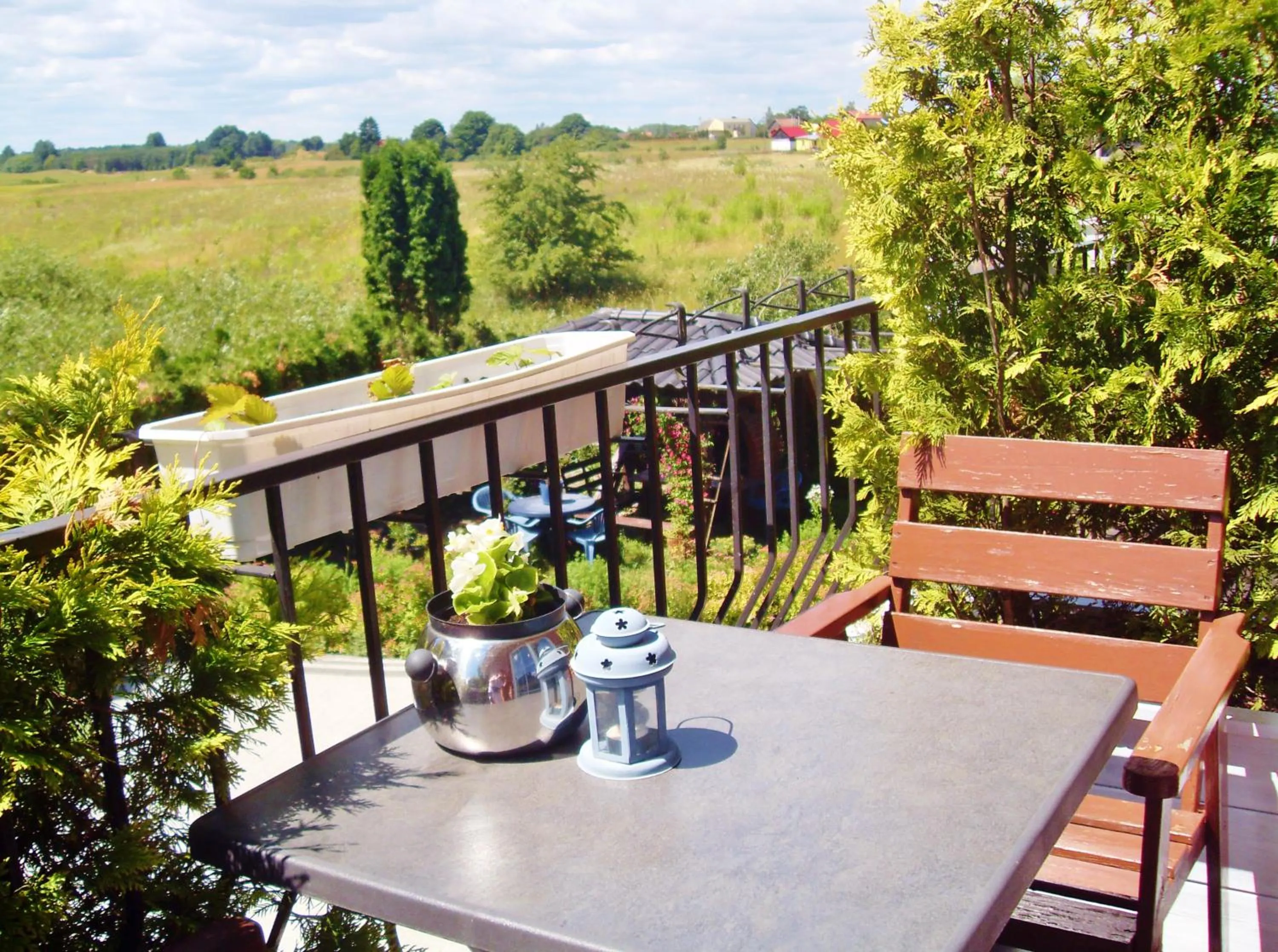 Balcony/Terrace in Willa Cyklada, grill, śniadania, jezioro,przystań,tawerna-200m, park linowy-400m, centrum,aquapark-900m