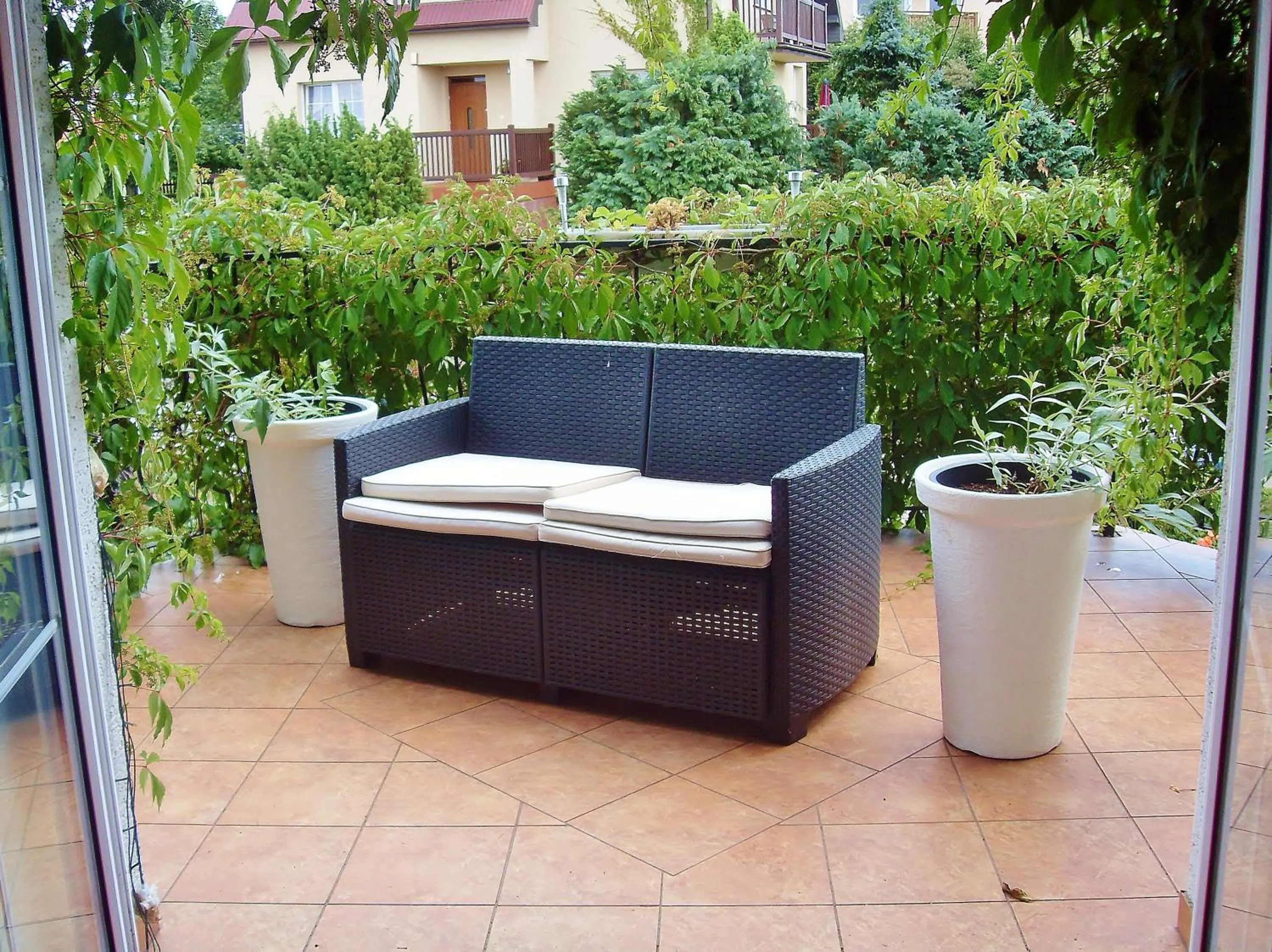 Balcony/Terrace in Willa Cyklada, grill, śniadania, jezioro,przystań,tawerna-200m, park linowy-400m, centrum,aquapark-900m