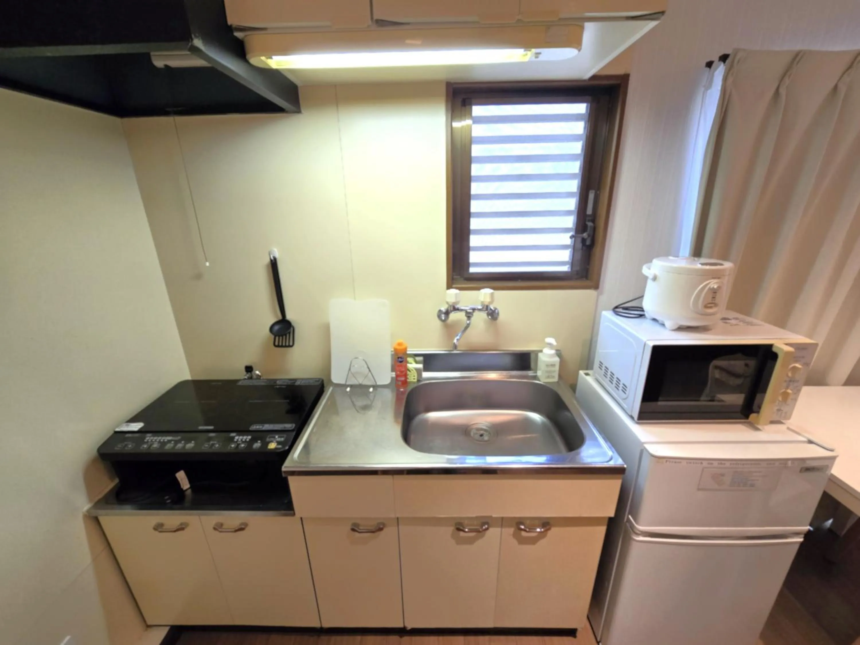 Kitchen or kitchenette in Comfort CUBE PHOENIX Beppu (やよいビル)