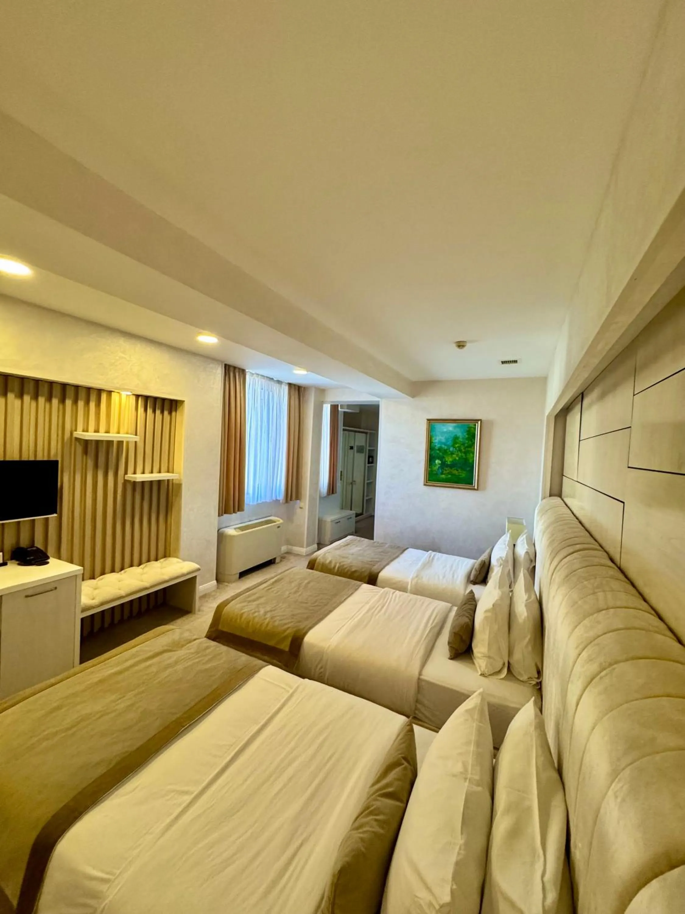 Bed in Ganjali Plaza Hotel