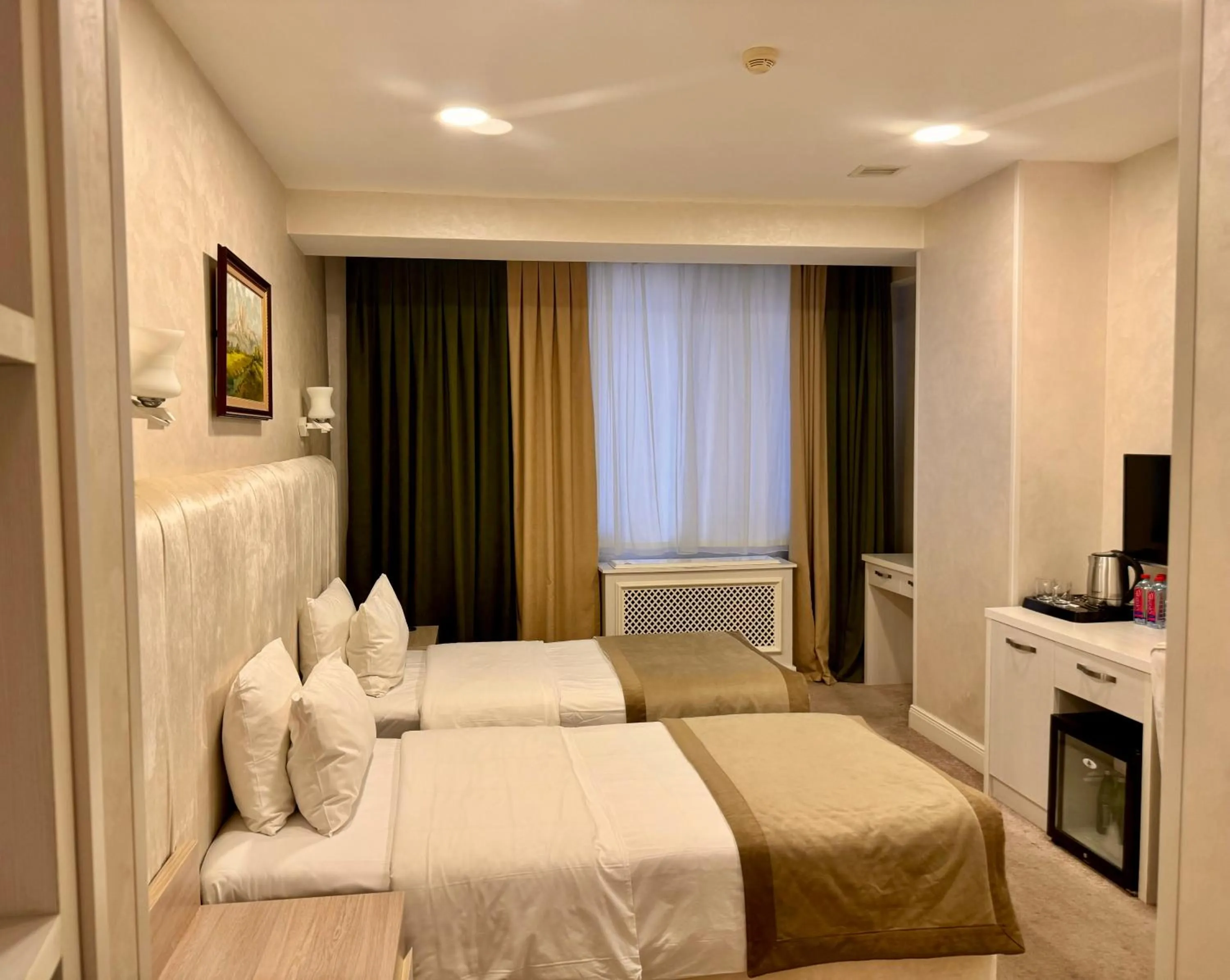 Bed in Ganjali Plaza Hotel