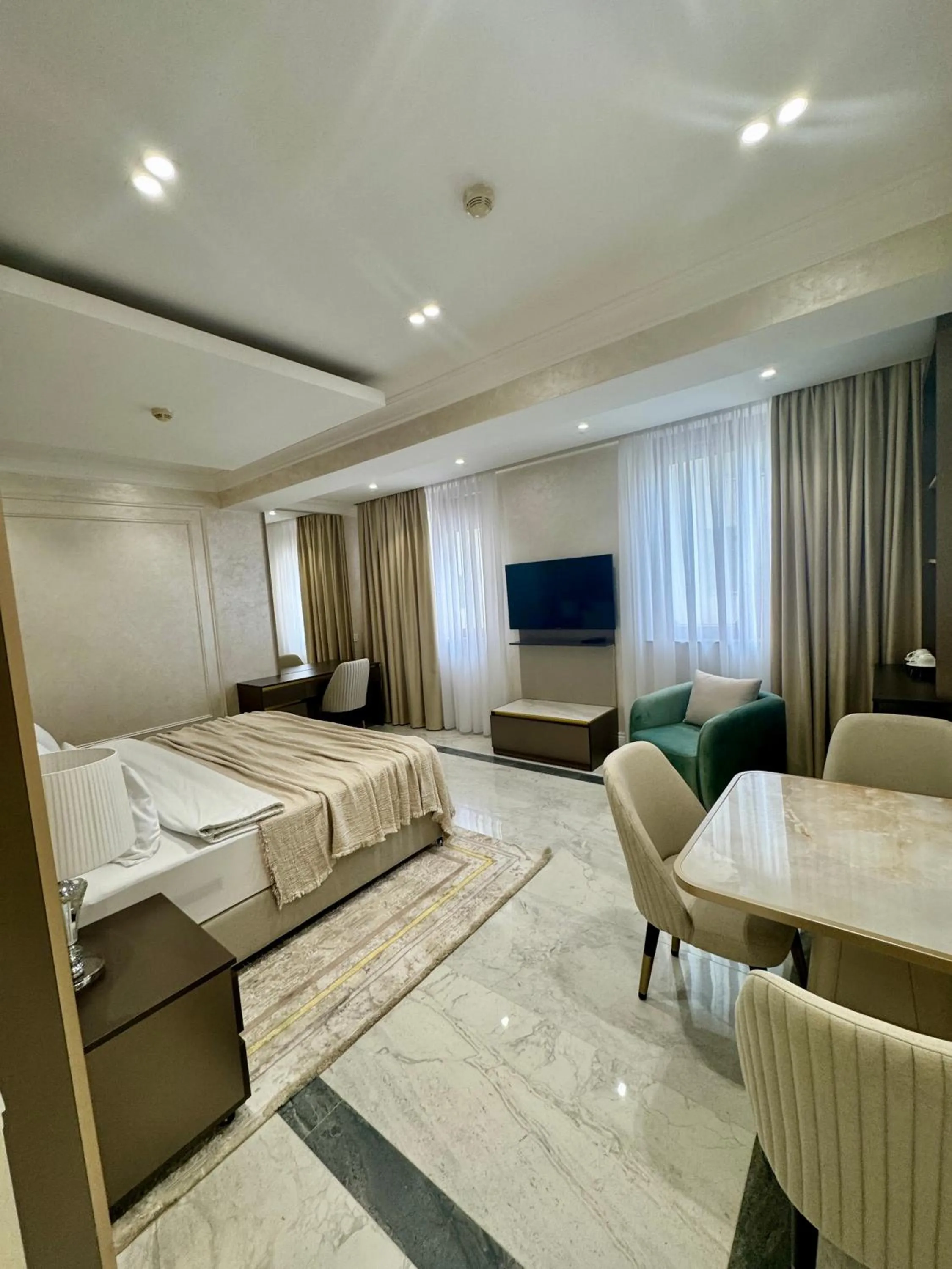 TV and multimedia, Bed in Ganjali Plaza Hotel