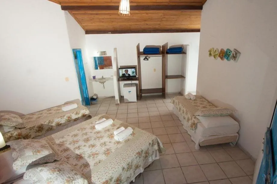 Bed in Pousada Varanda do Sol