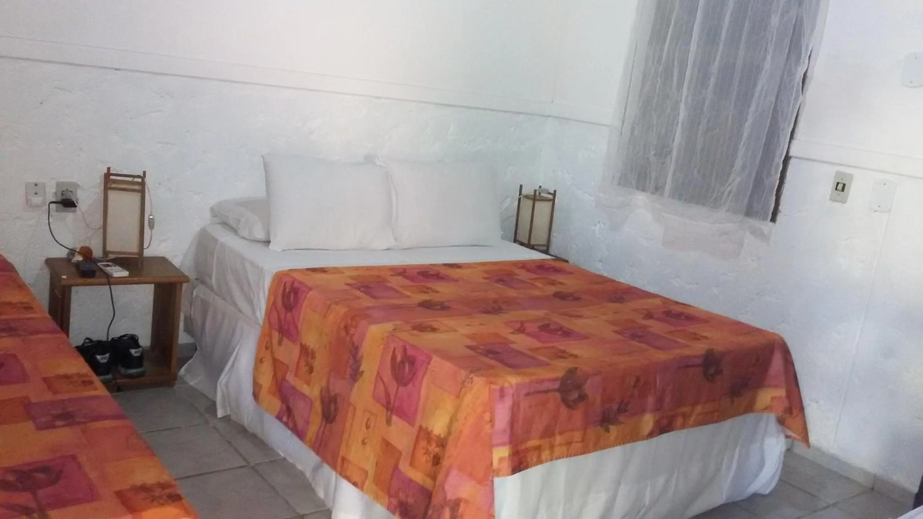 Bed in Pousada Varanda do Sol