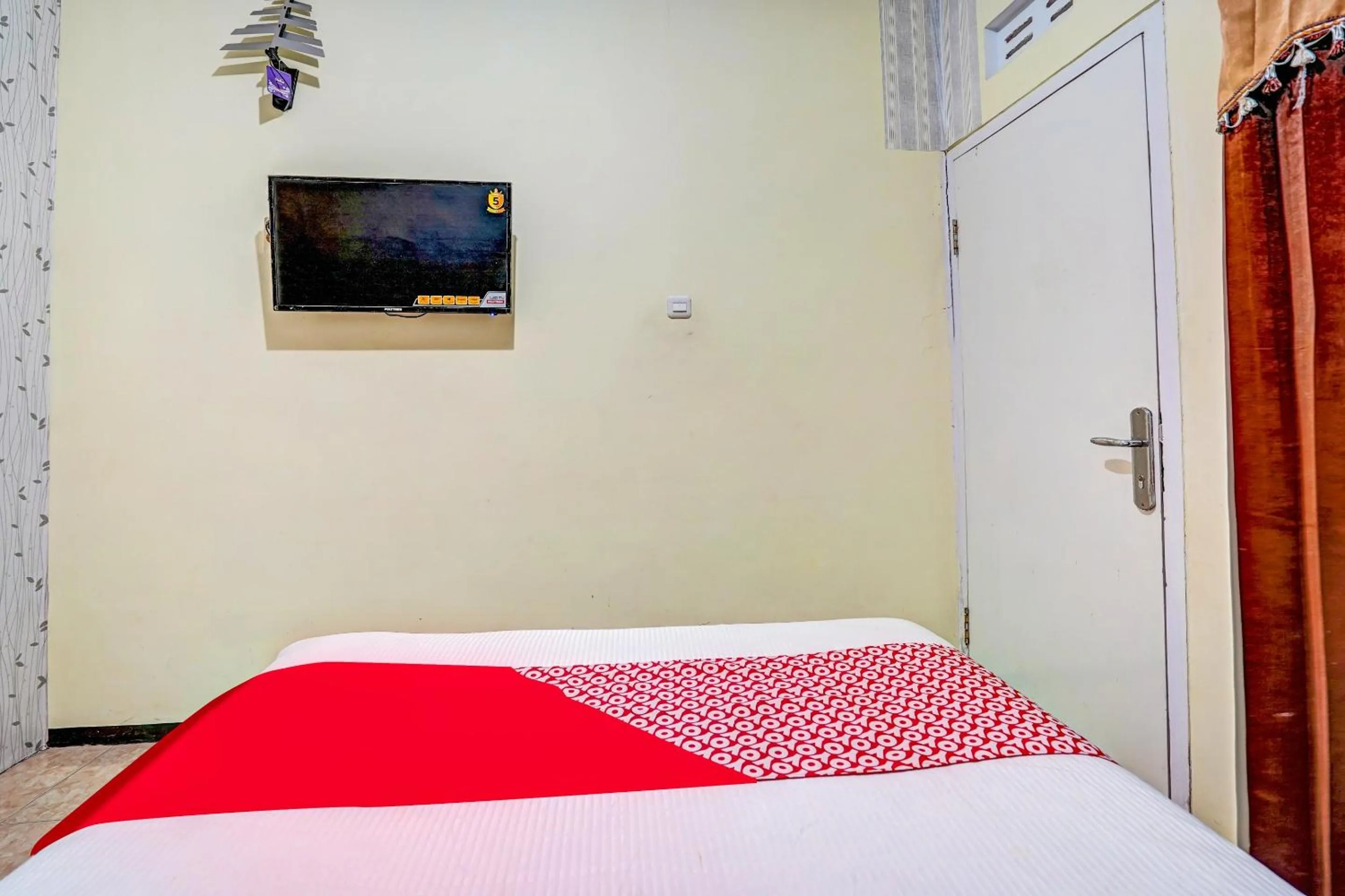 Bedroom in Hotel O Lancar Homestay Syariah