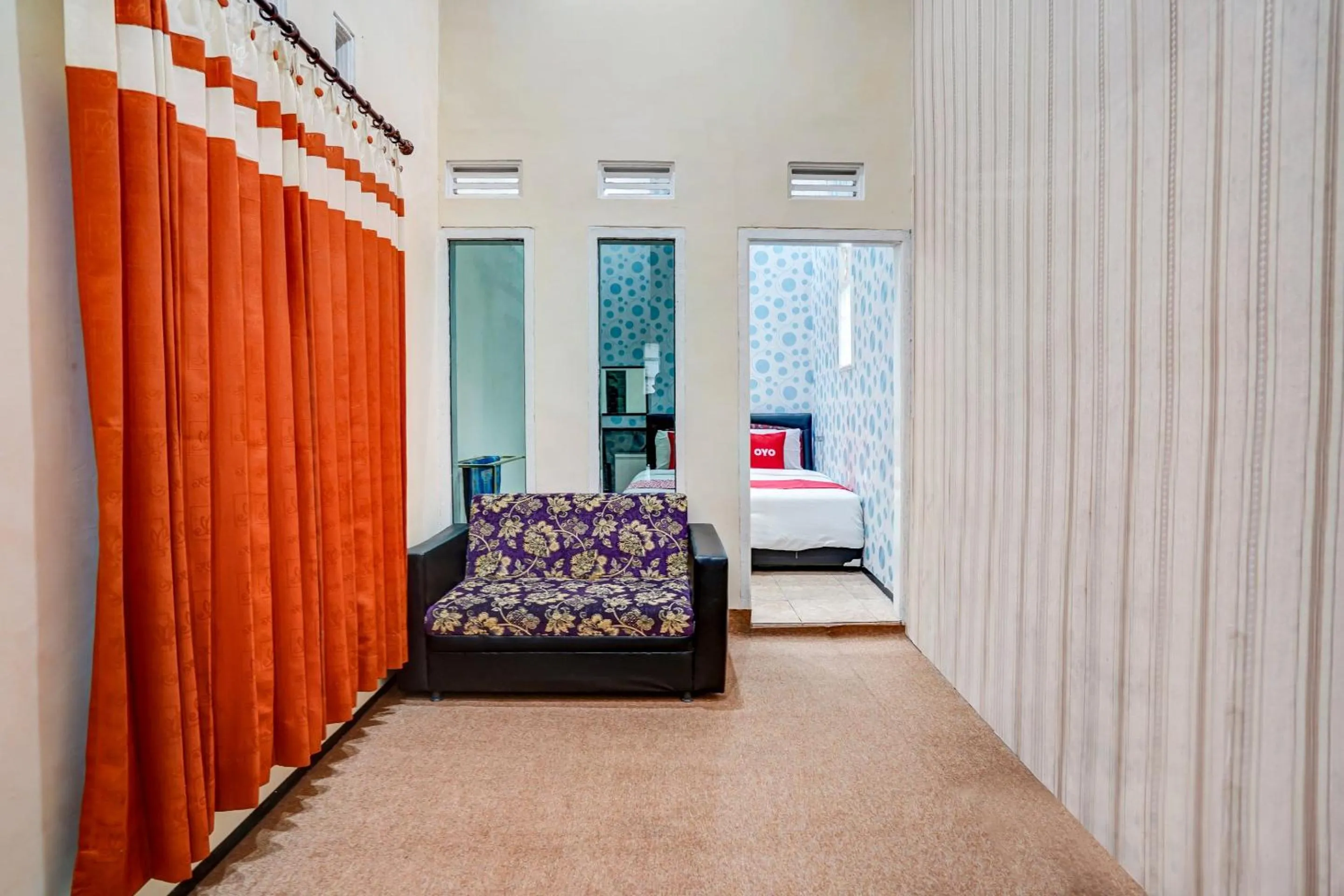 Living room in Hotel O Lancar Homestay Syariah