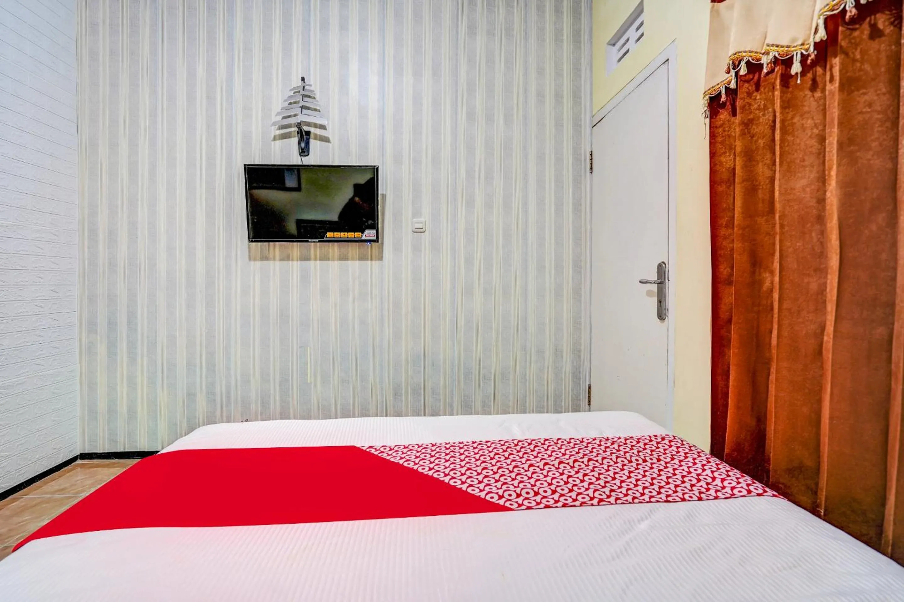 Bedroom in Hotel O Lancar Homestay Syariah