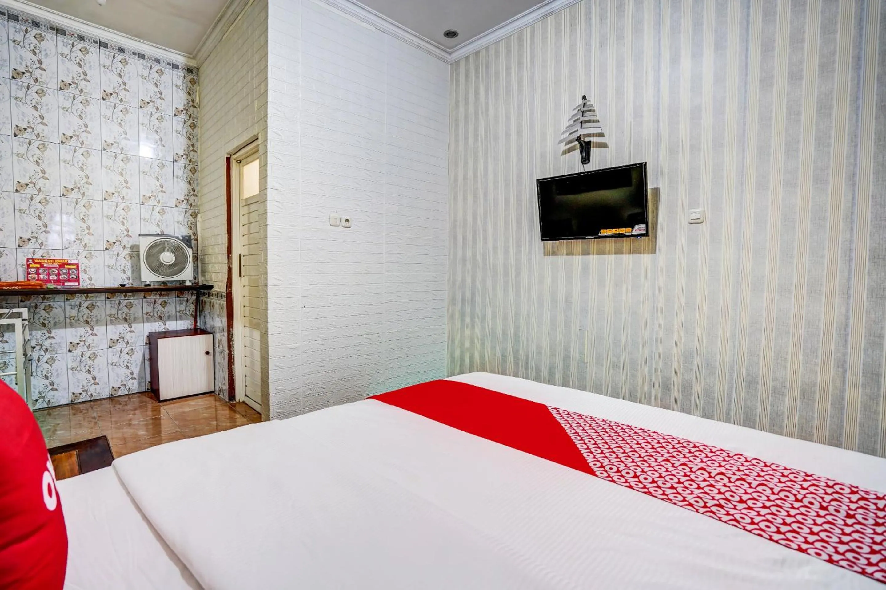 Bedroom in Hotel O Lancar Homestay Syariah