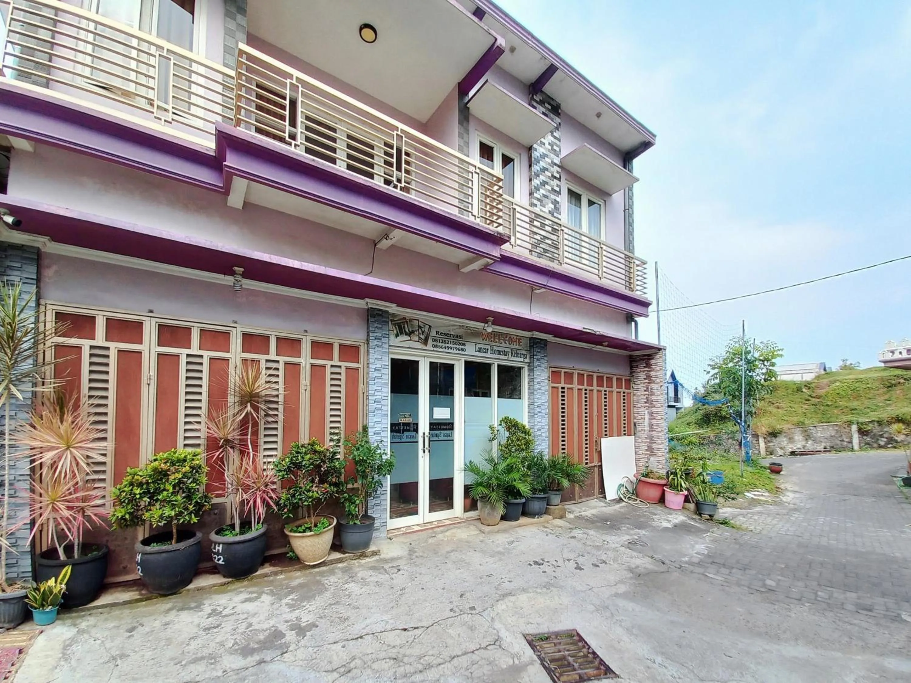 Facade/entrance in Lancar Homestay Syariah near BNS Mitra RedDoorz