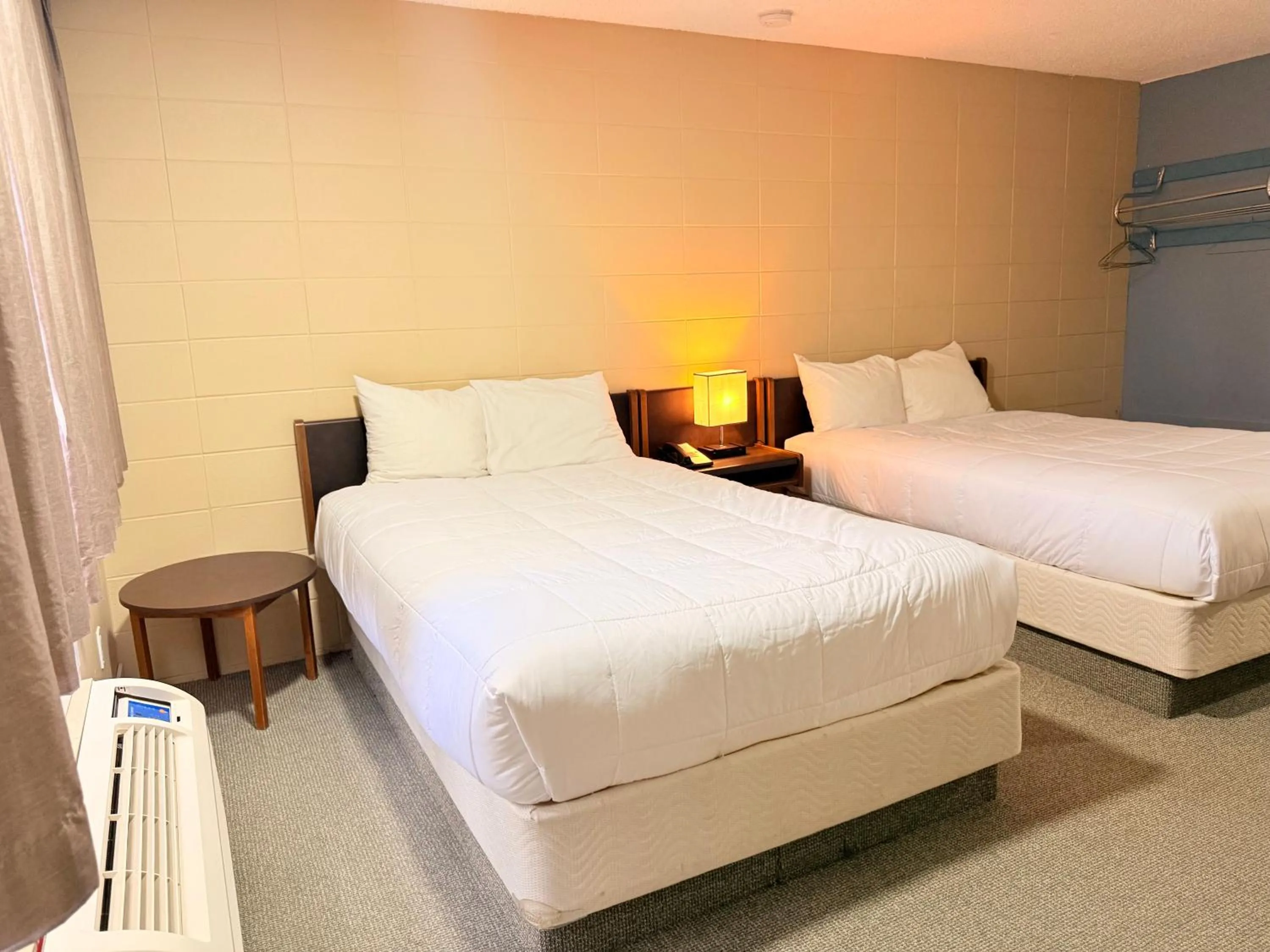 Bed in Capri Motor Inn