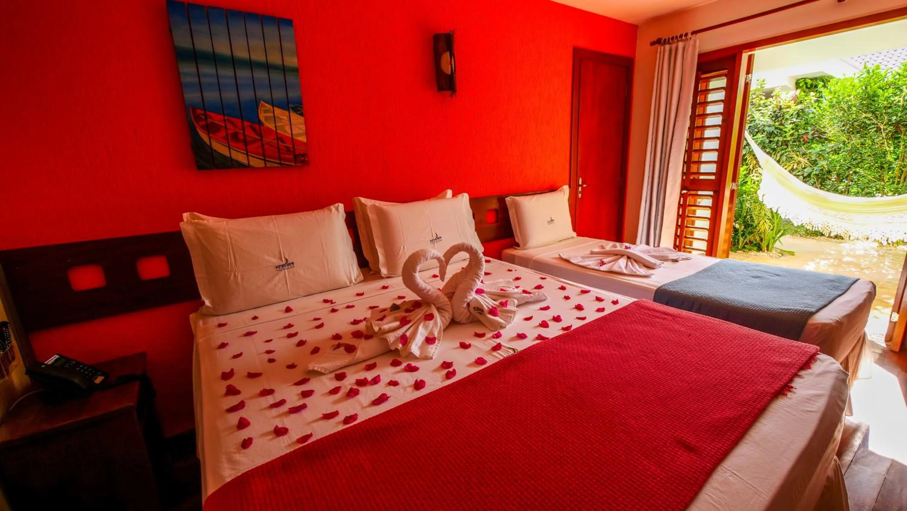 Bed in Pousada Windjeri