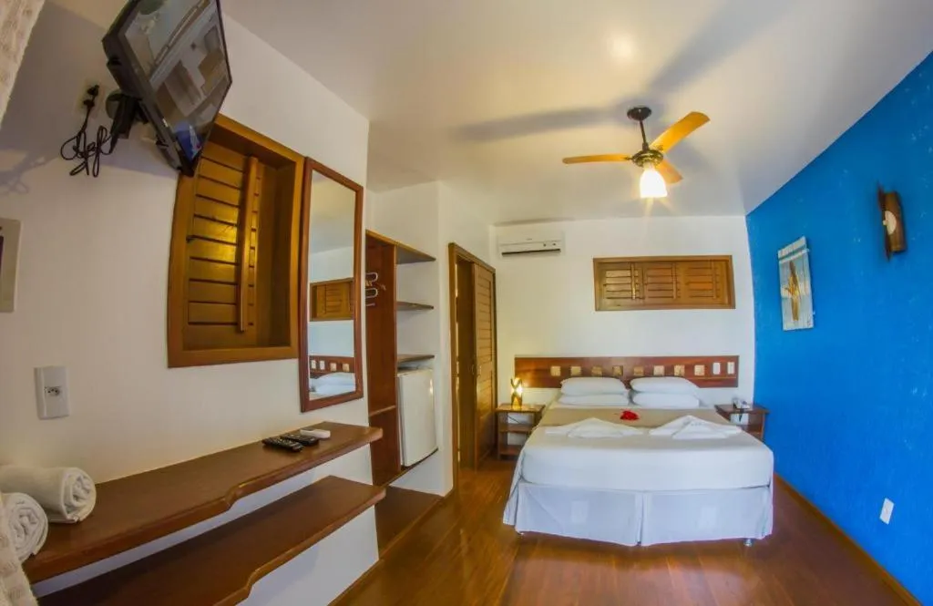 Bed in Pousada Windjeri