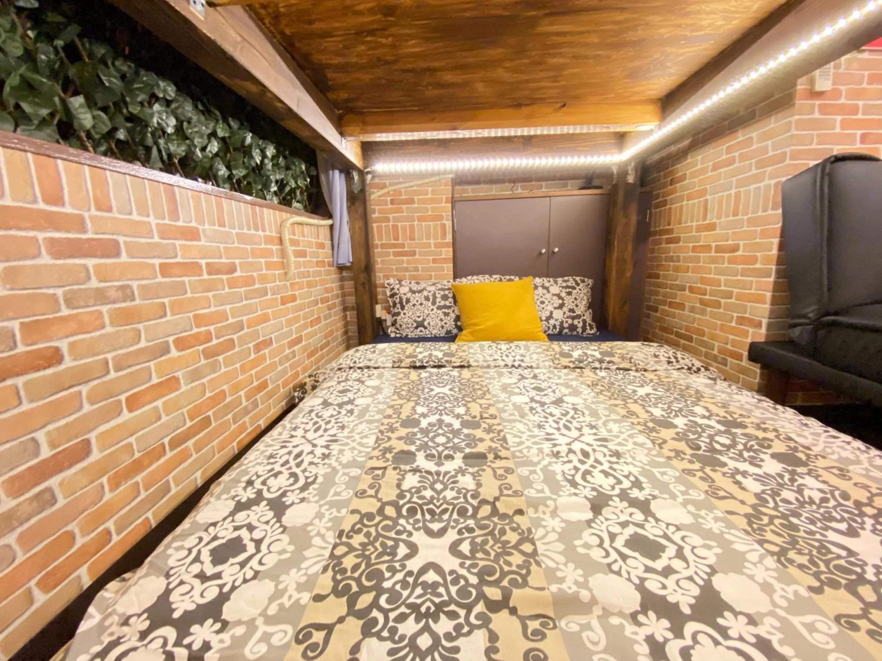 Bed in Hotel Orange House