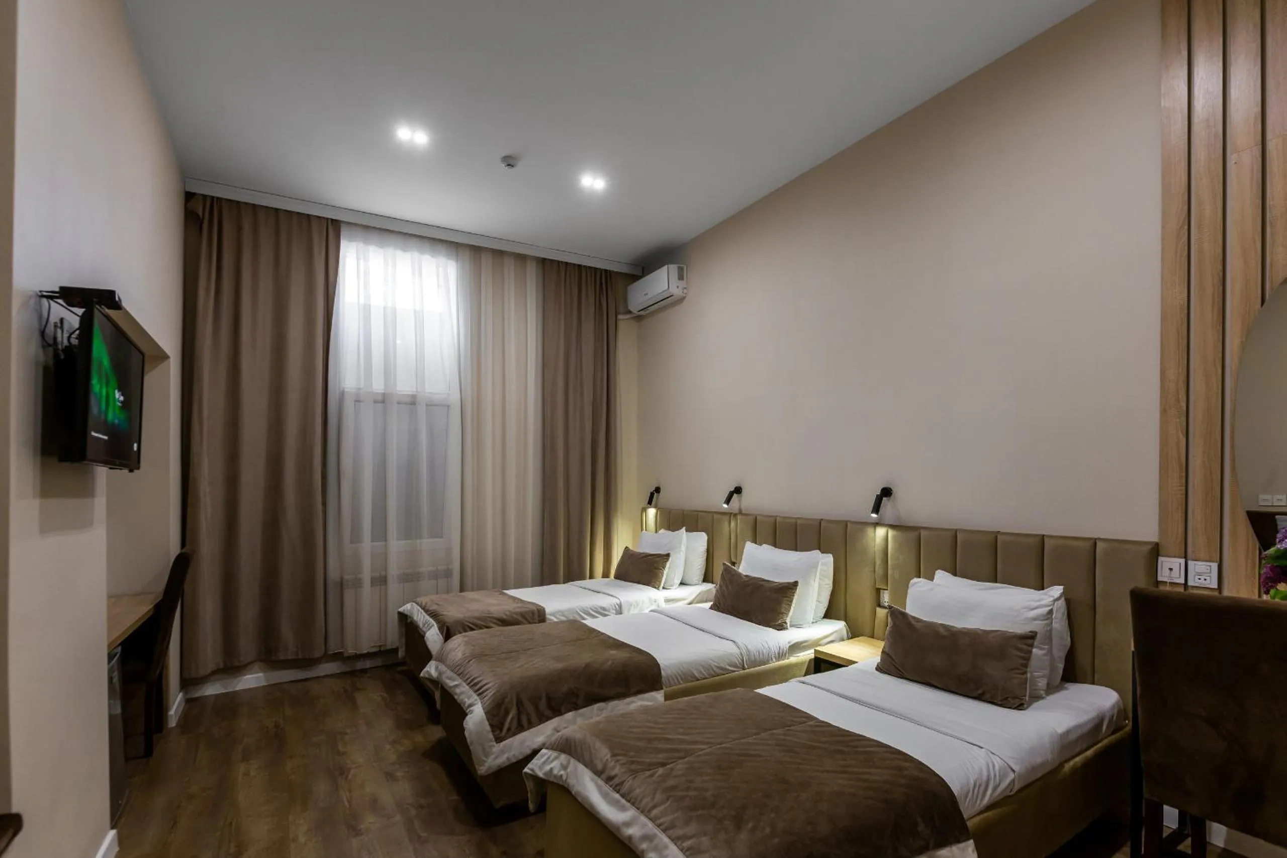 Bed in Seven Boutique Hotel Baku