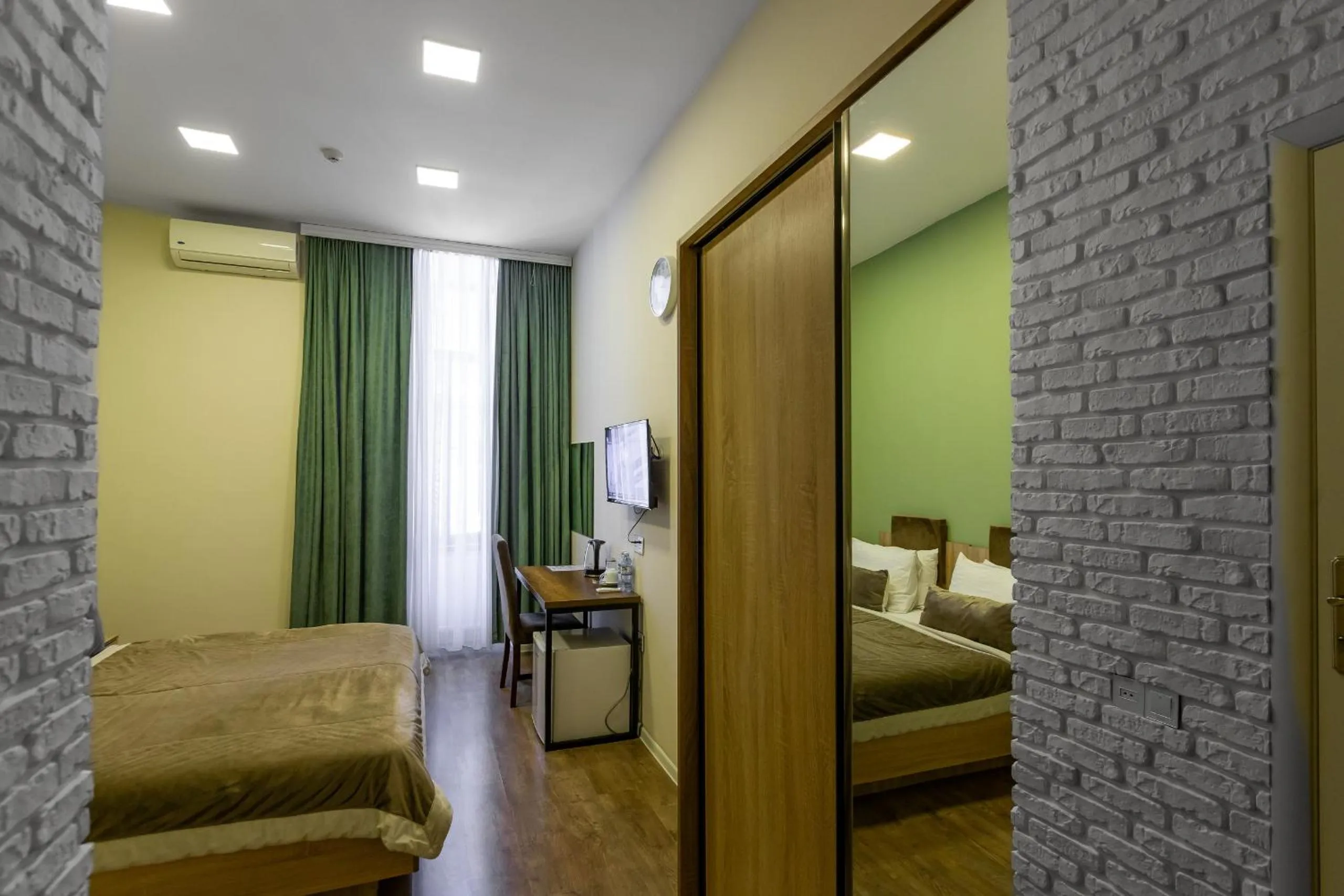 Bed in Seven Boutique Hotel Baku