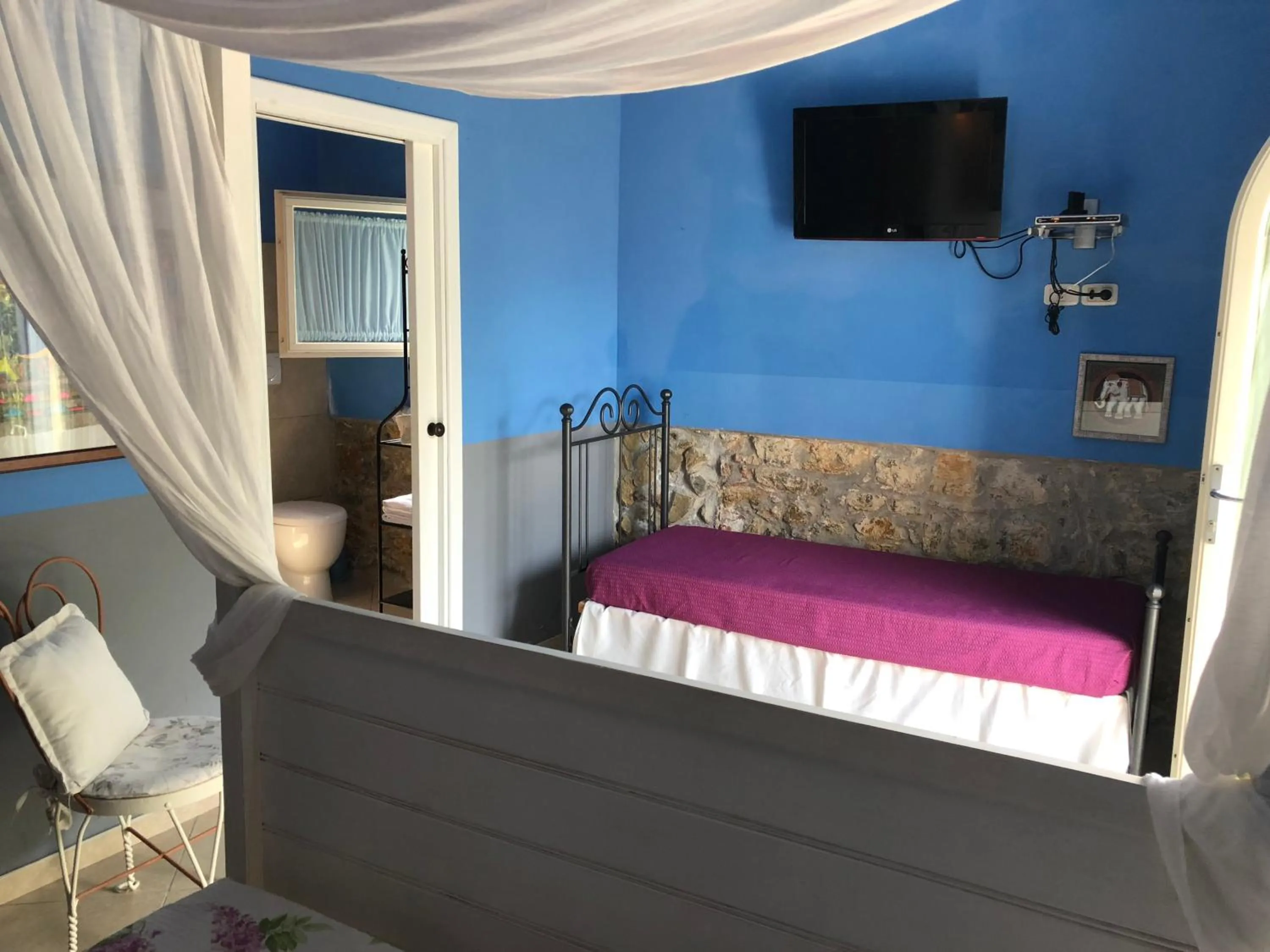Bed in La Locanda della Vecchia Hosteria