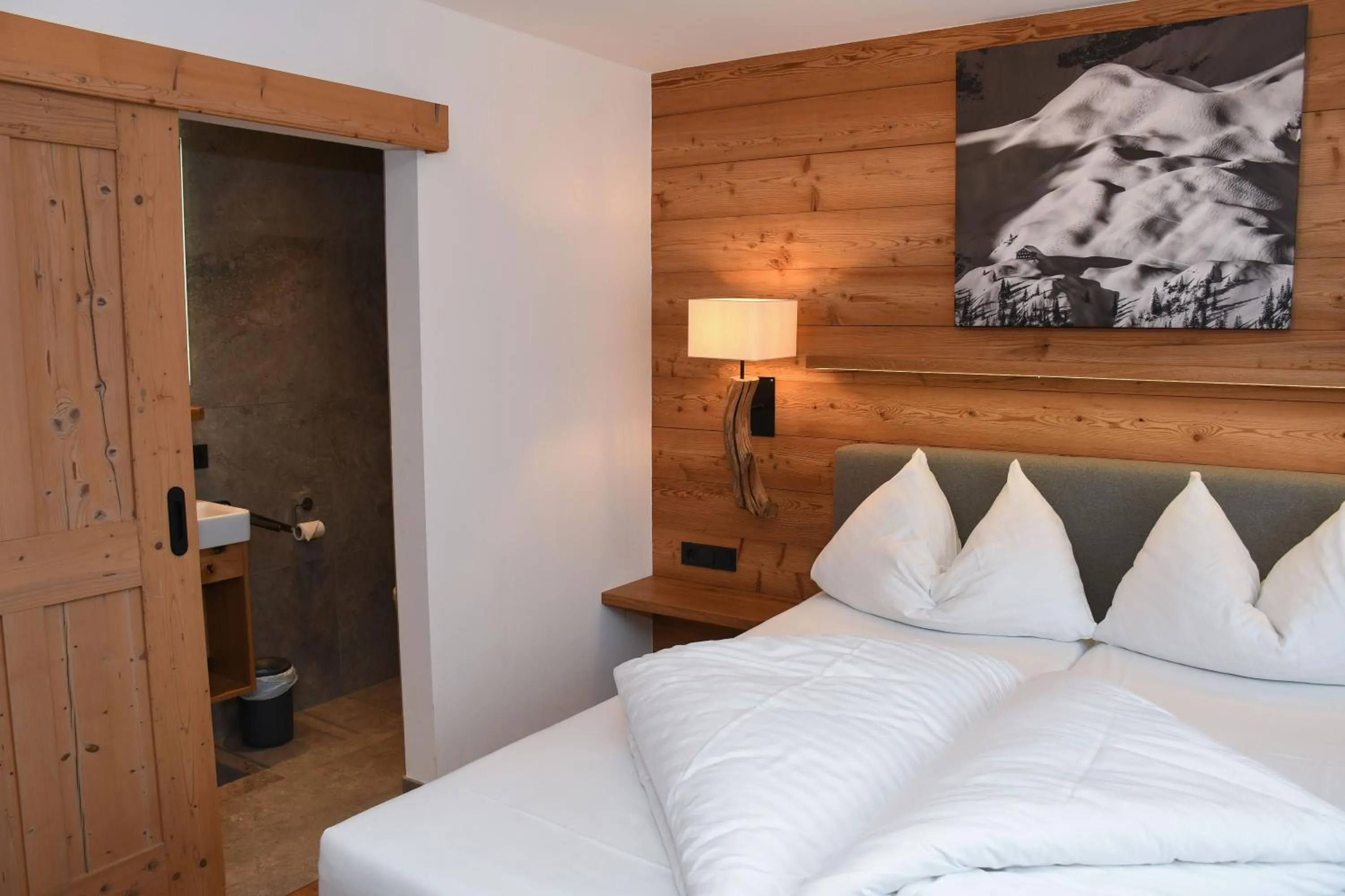 Bed in Astn Hütten Residenz Waldsicht Königsleiten - Ferienwohnungen