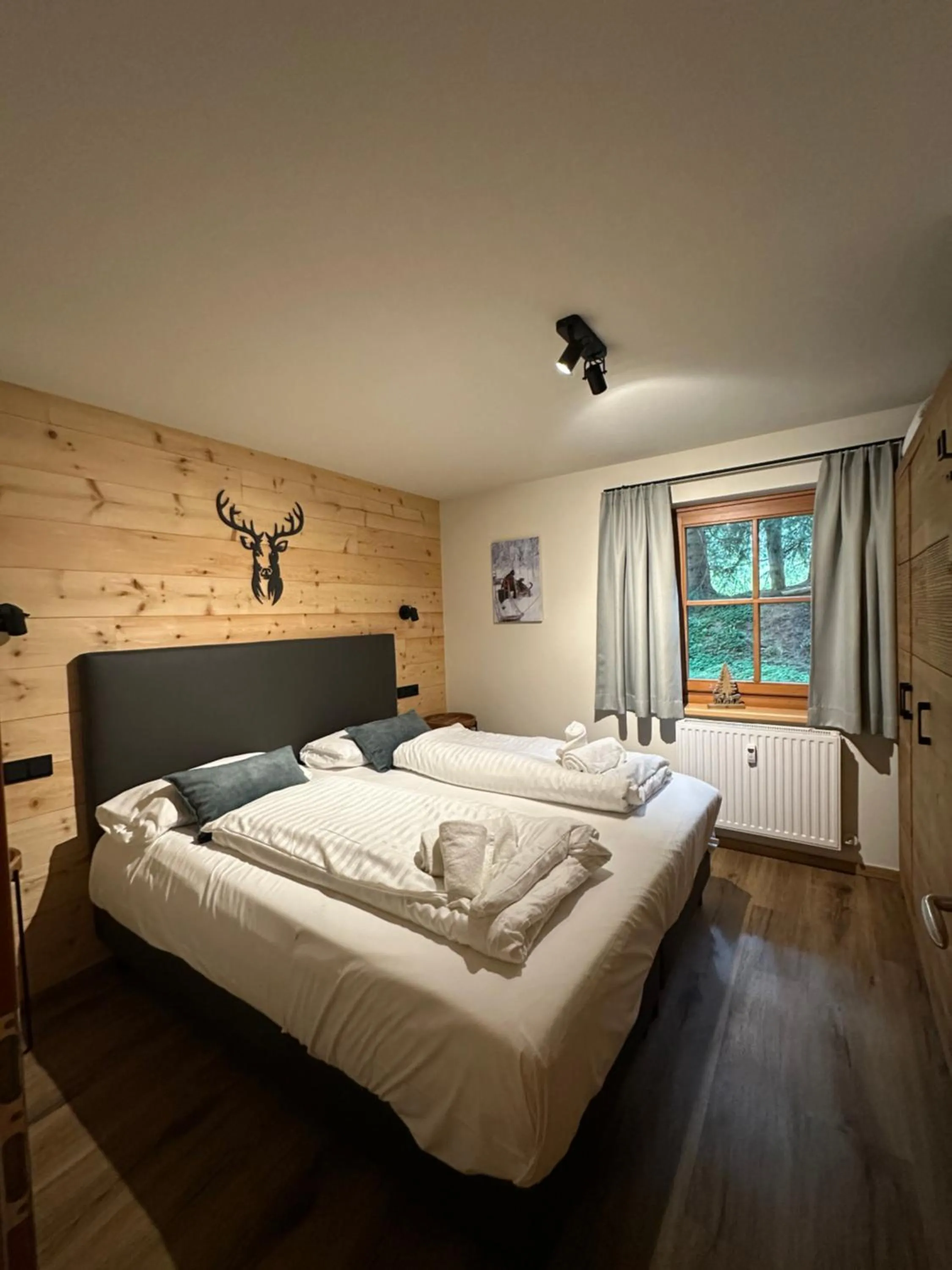 Bed in Astn Hütten Residenz Waldsicht Königsleiten - Ferienwohnungen