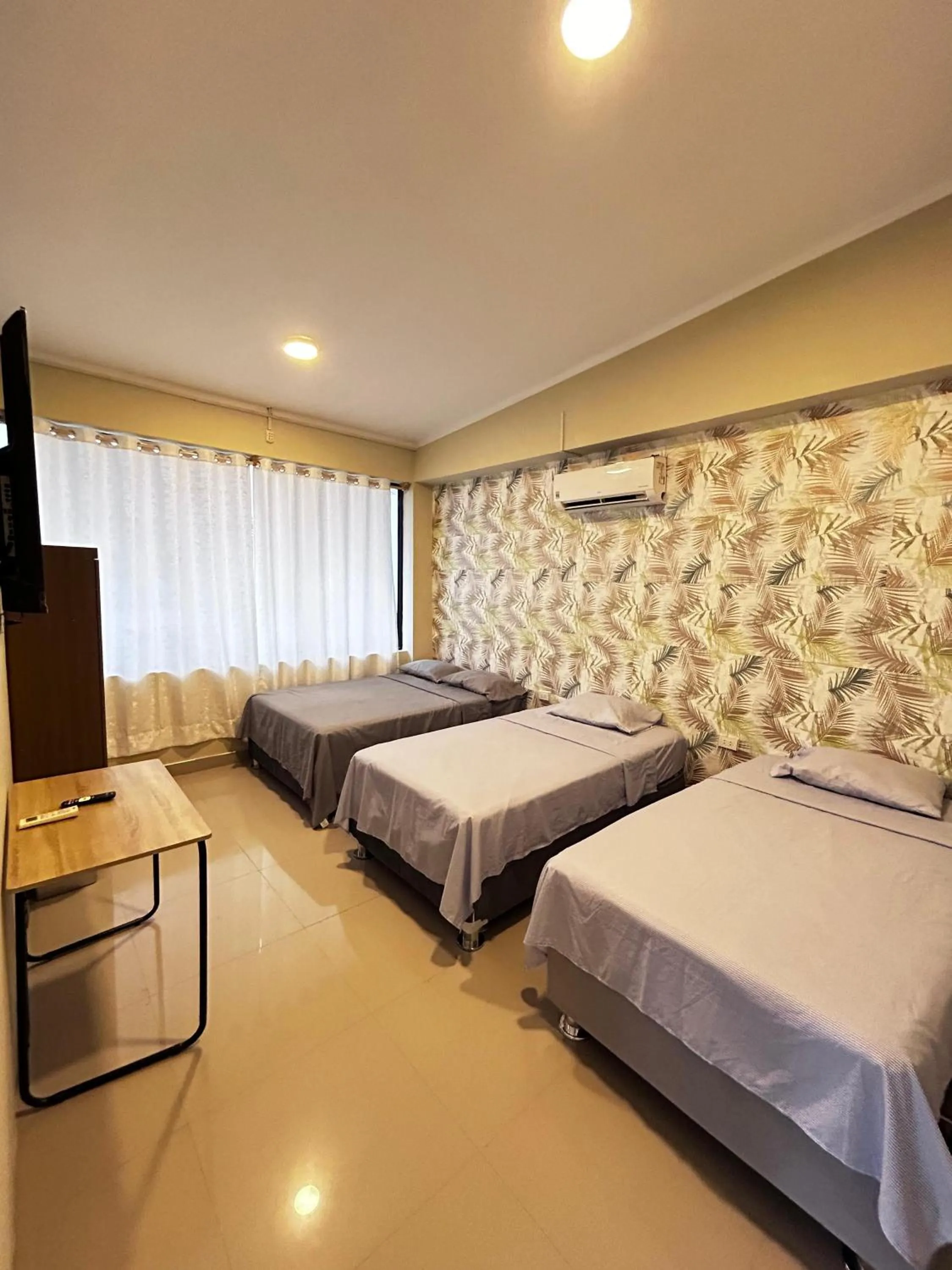 Bed in Hostal Cordillera Azul