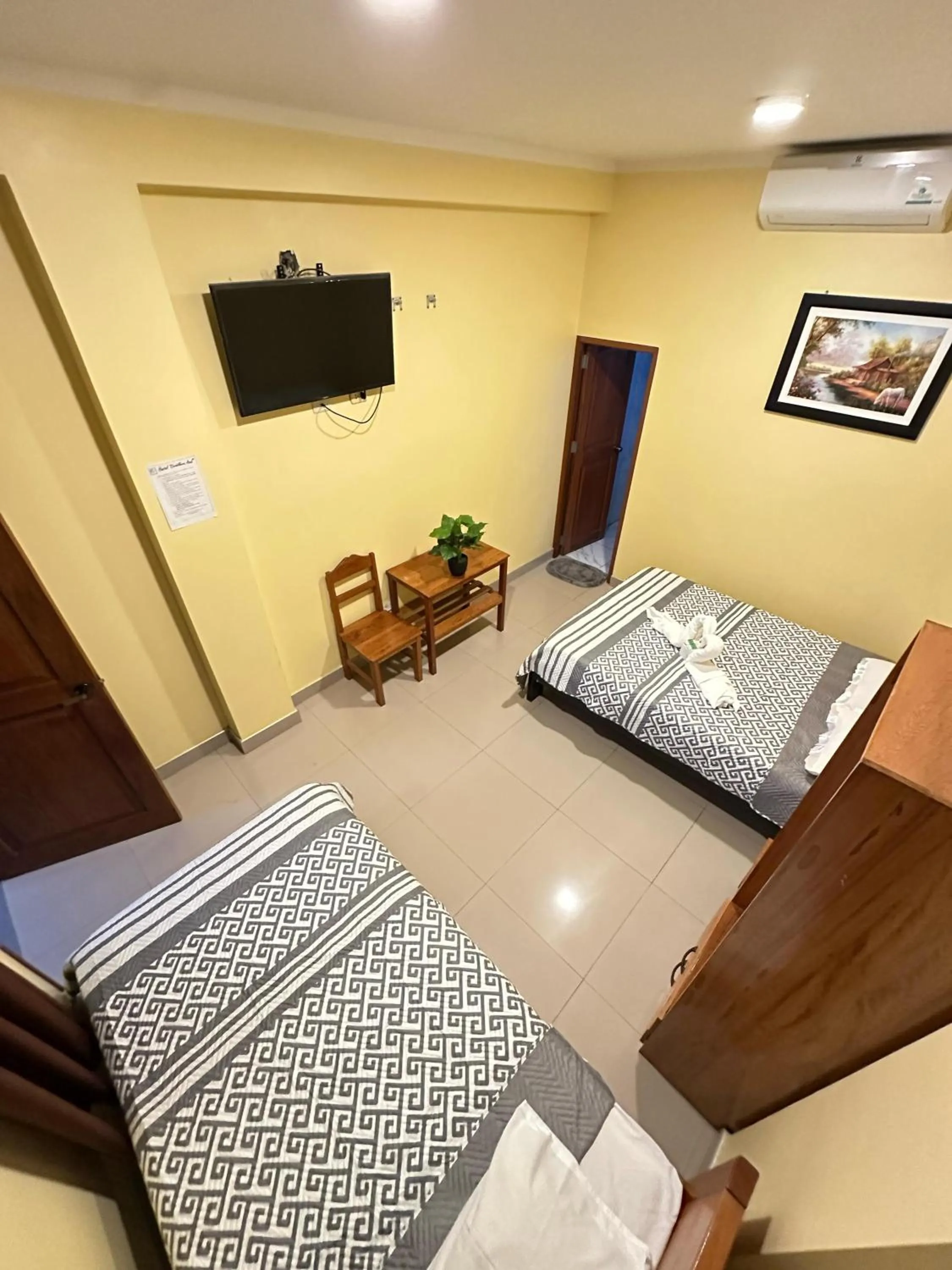 Bed in Hostal Cordillera Azul