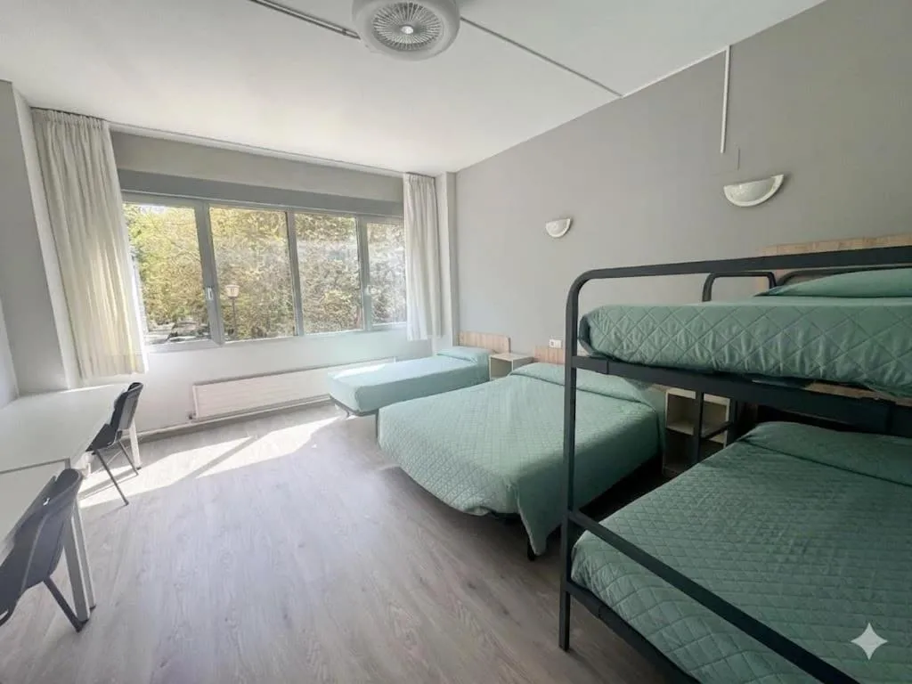 Bed in Residencia Albergue Jaca