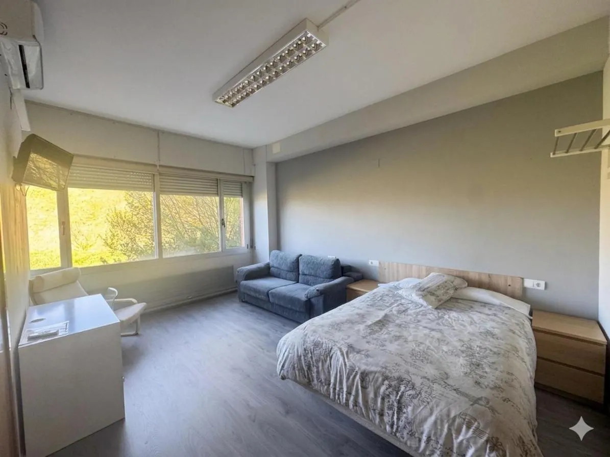 Bed in Residencia Albergue Jaca