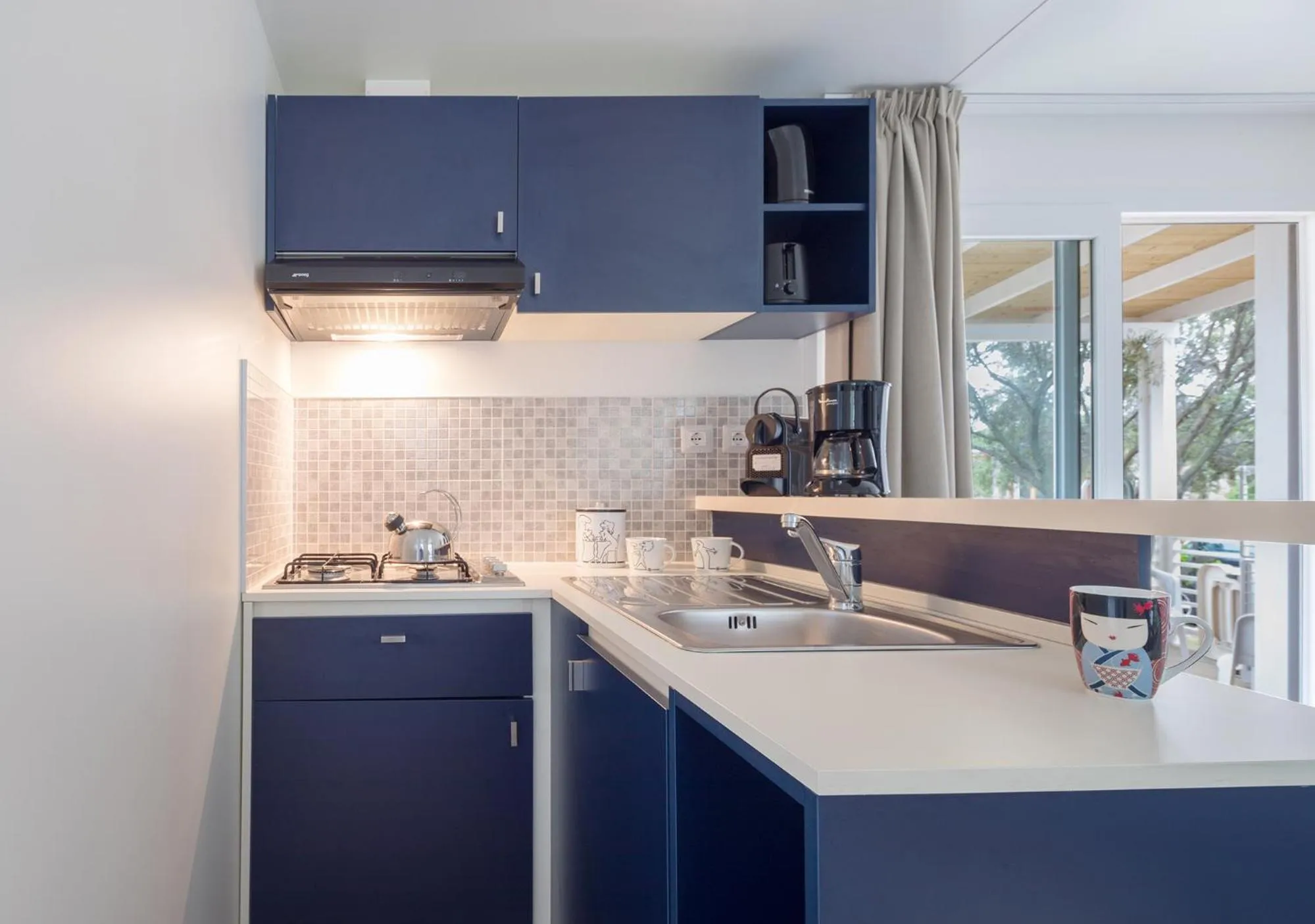 Kitchen or kitchenette in Camping Village Cavallino