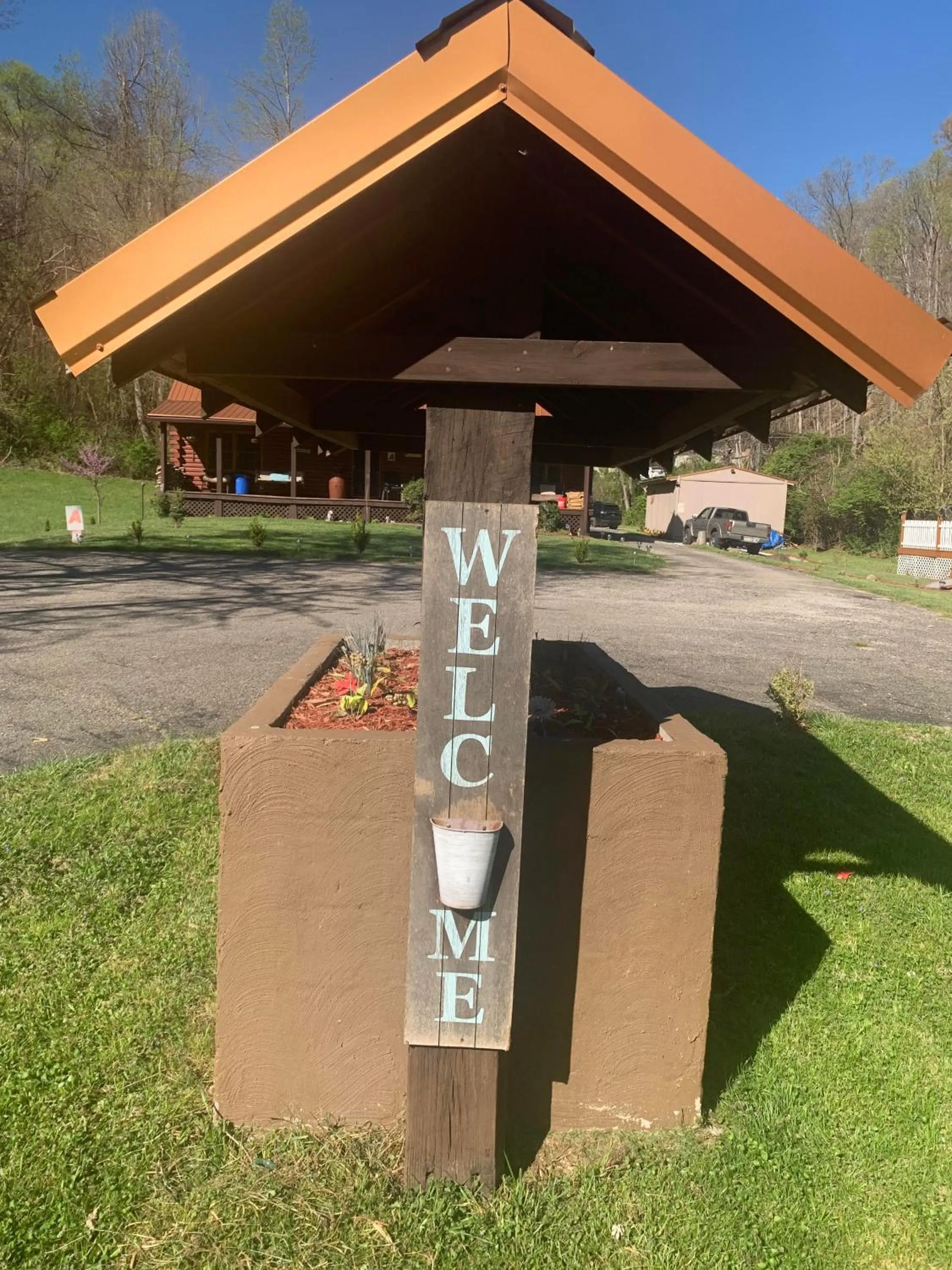 Property logo or sign in Log Cabin in the Field