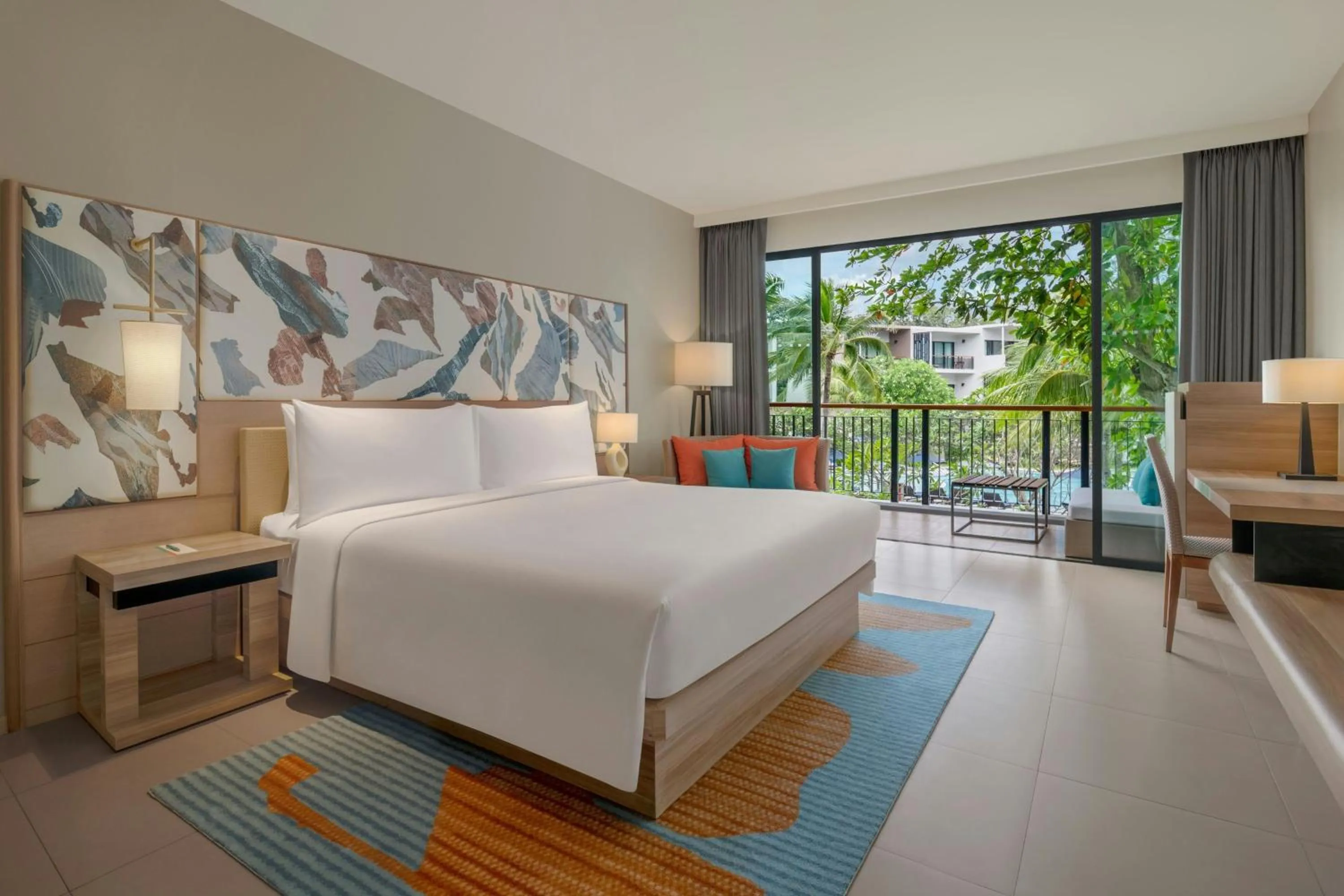 Bed in Le Meridien Phuket Mai Khao Beach Resort