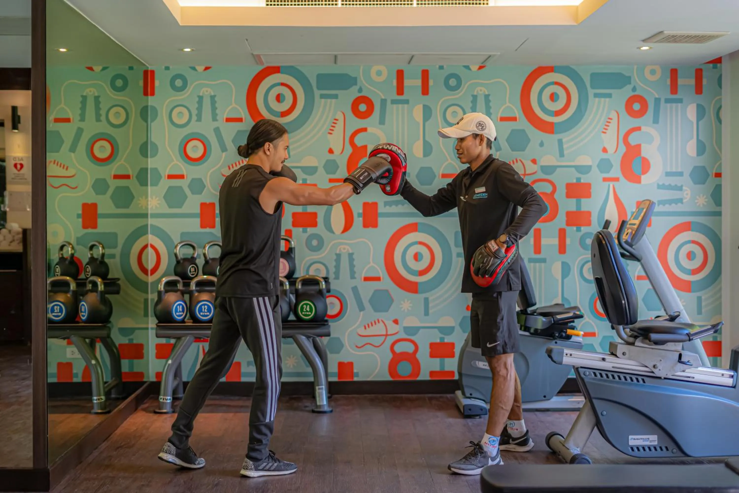 People in Le Meridien Phuket Mai Khao Beach Resort