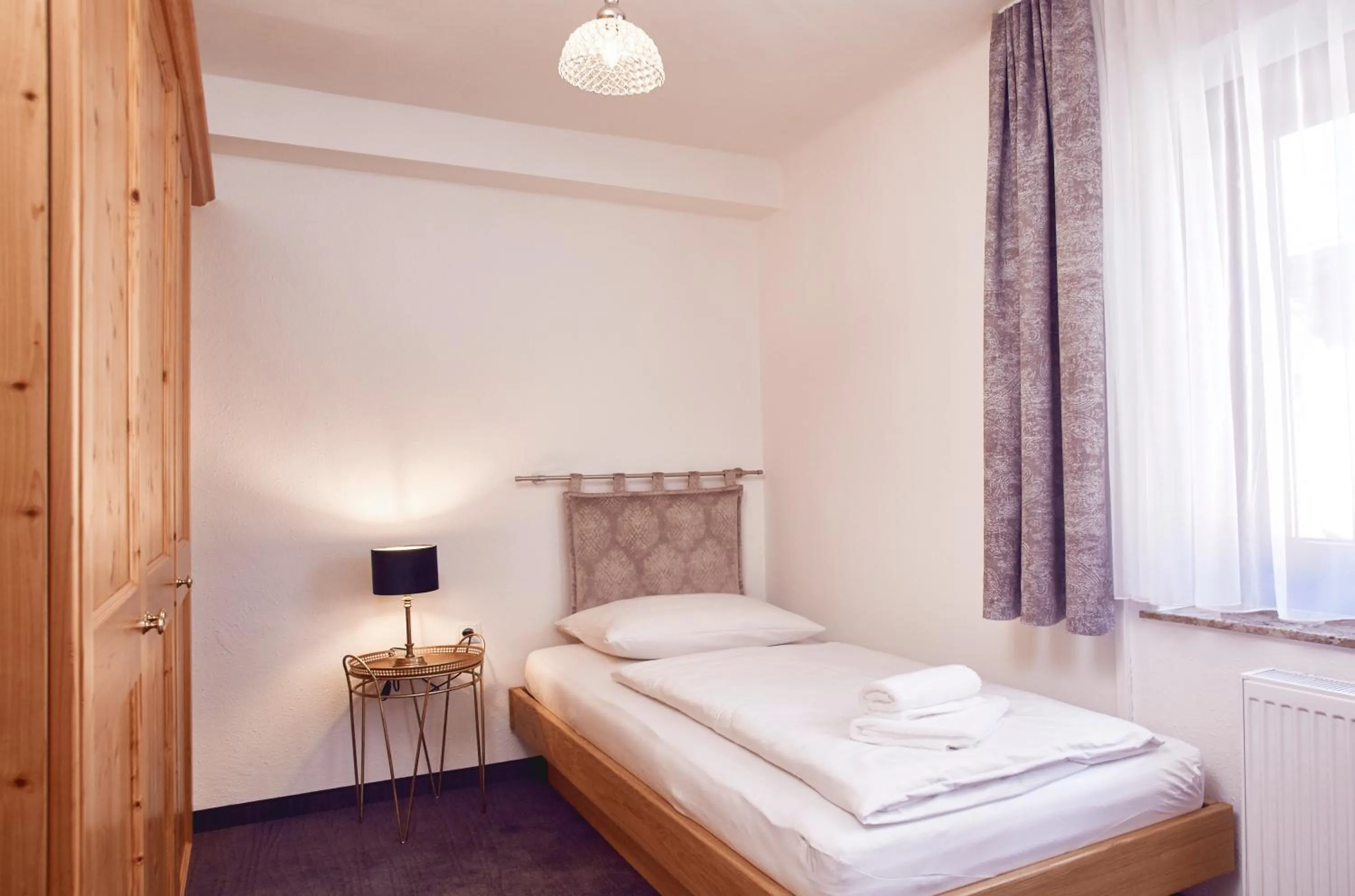 Photo of the whole room, Bed in Boutique-Gasthof Ueberfuhr