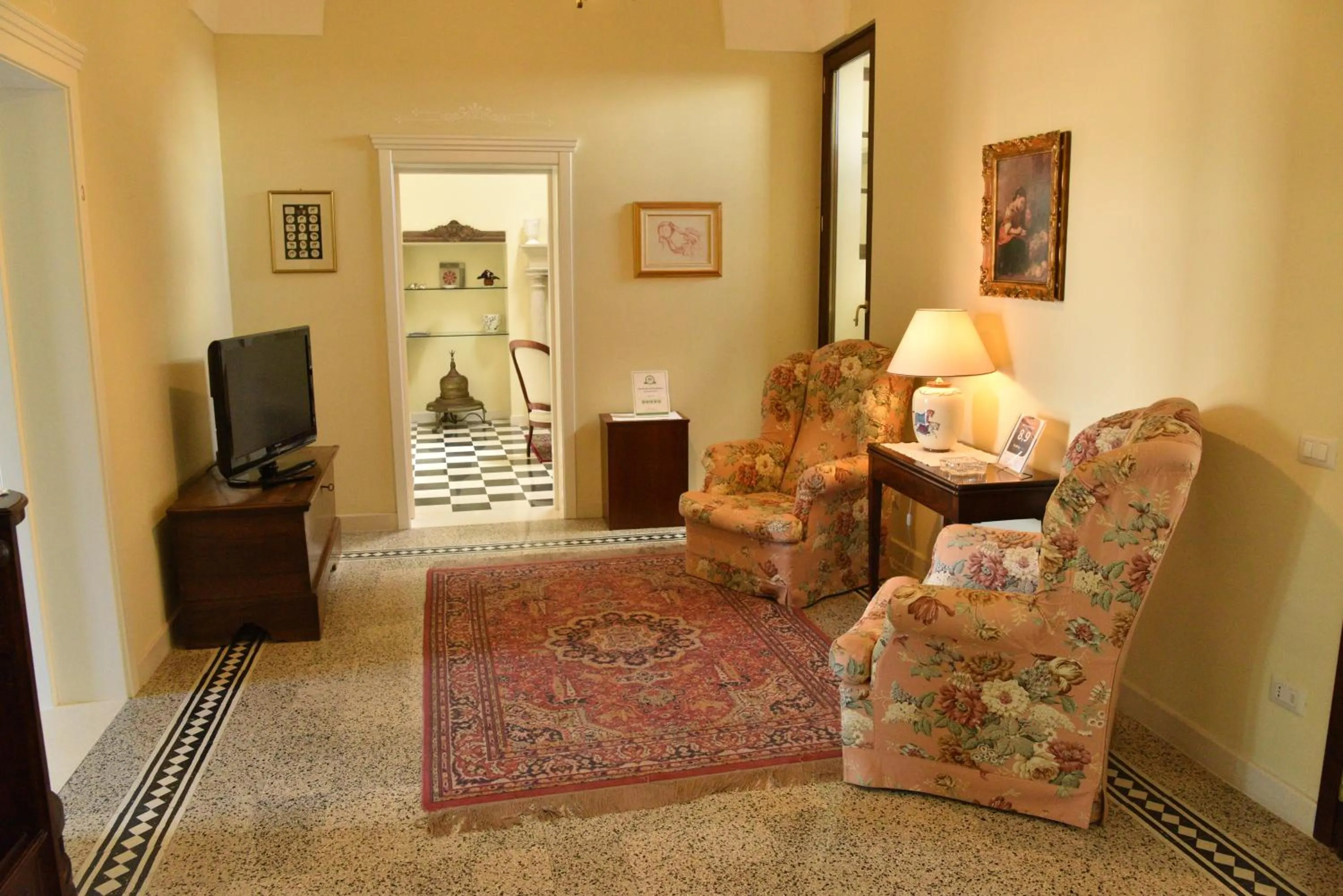 Communal lounge/ TV room in B&B Antica Corte
