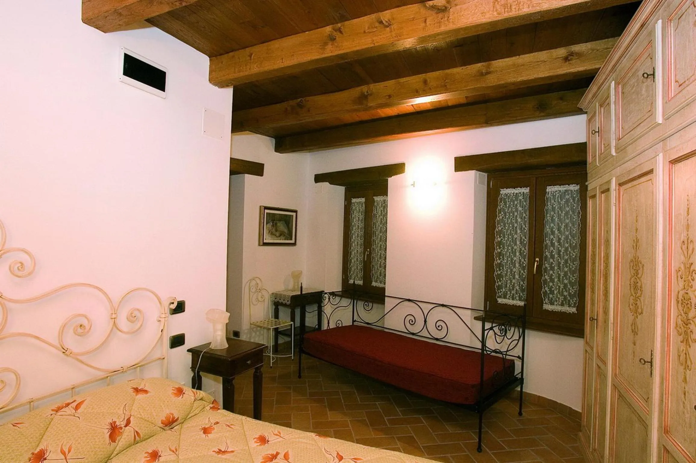 Decorative detail, Bed in La Torretta sul Borgo