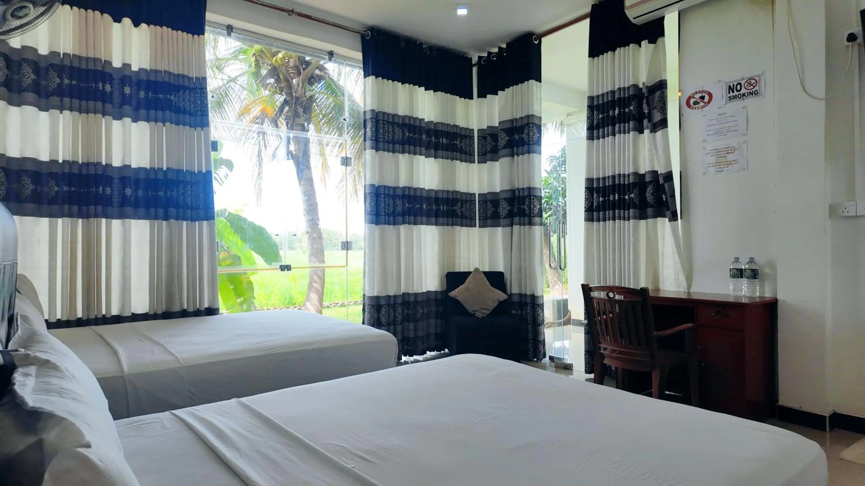 Bed in Rivonway Hotel Polonnaruwa