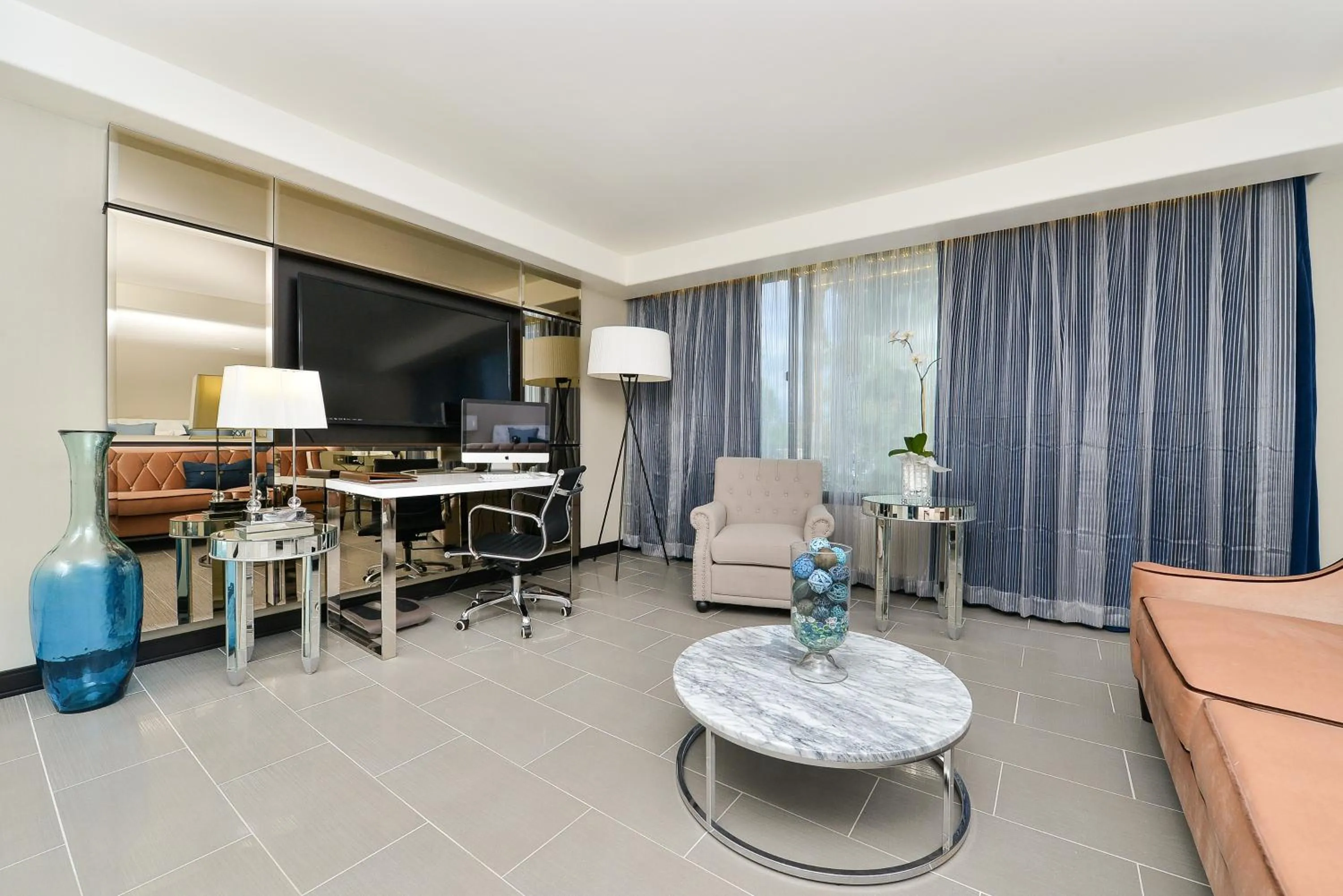 Living room in voco Laguna Hills by IHG