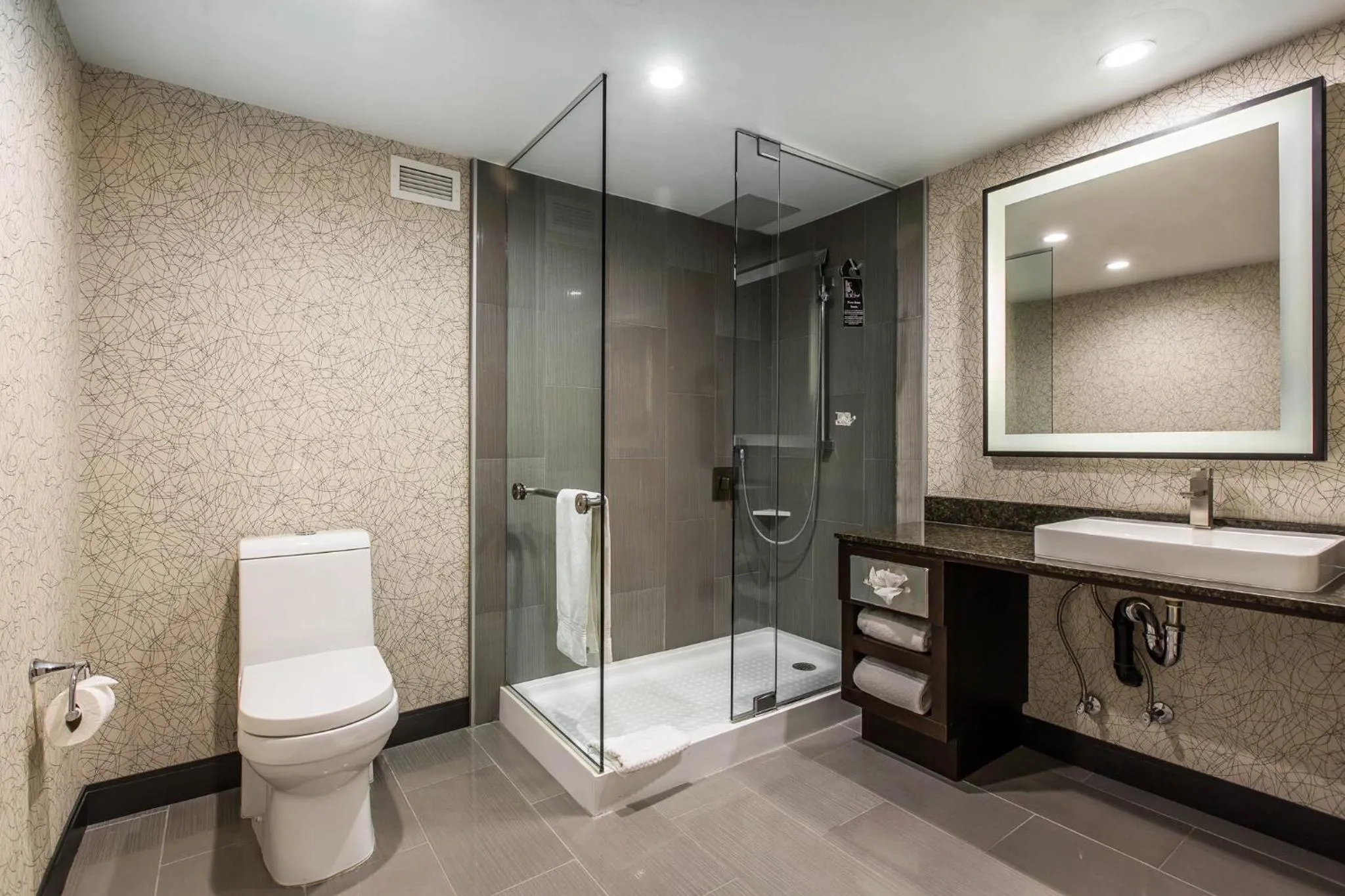 Bathroom in voco Laguna Hills by IHG