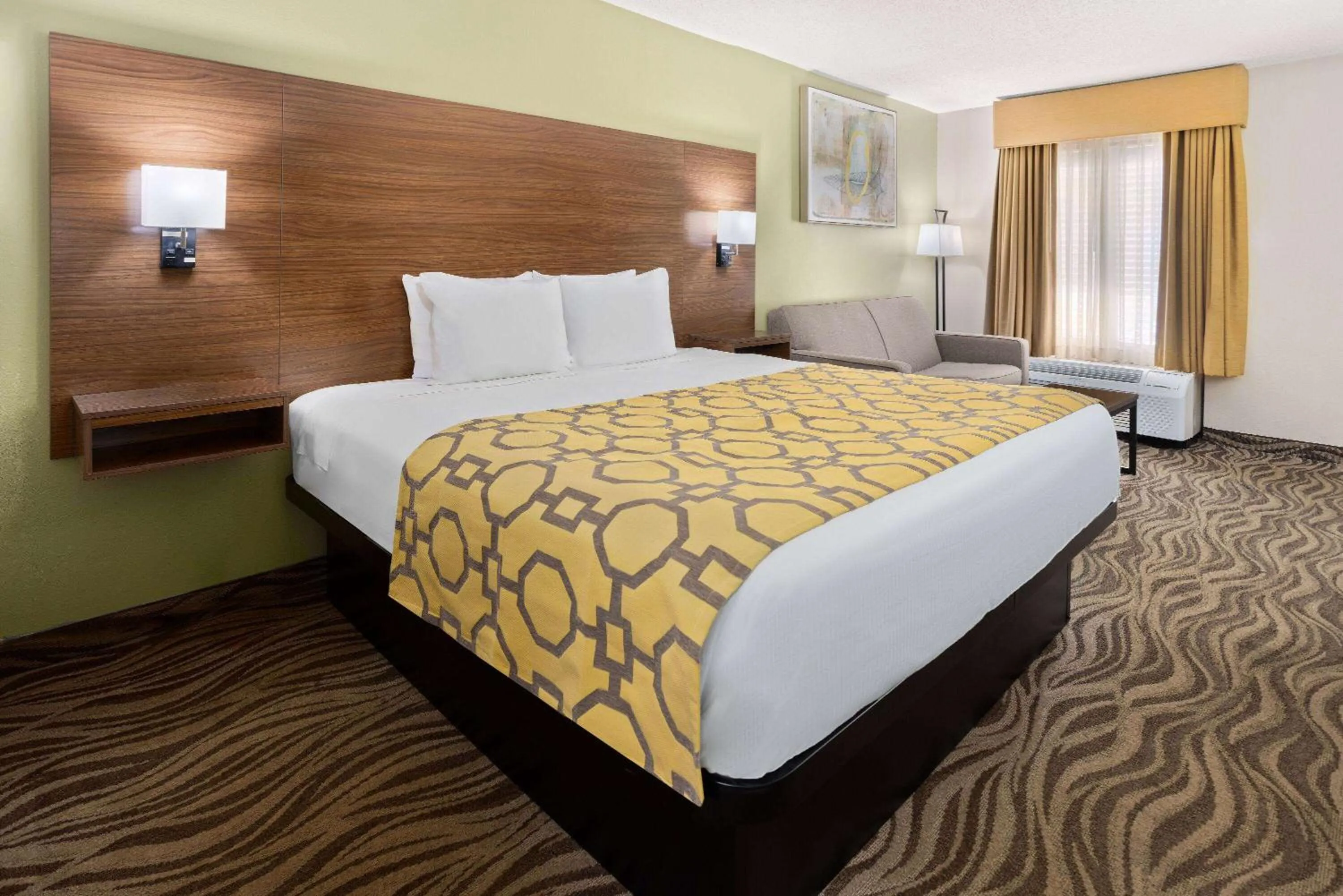 Photo of the whole room, Bed in Baymont by Wyndham Griffin