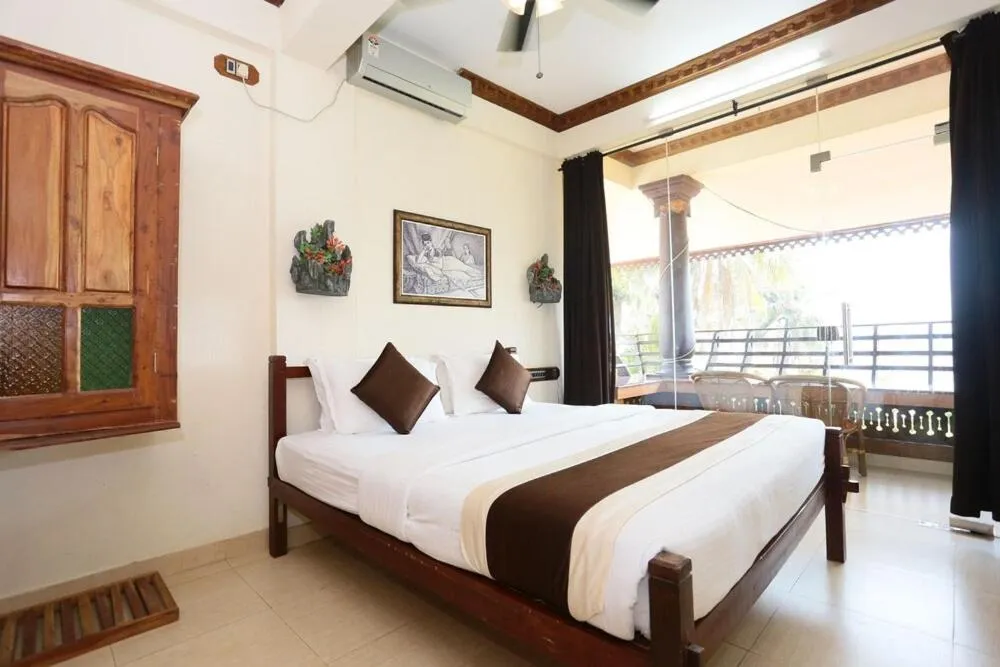 Photo of the whole room, Bed in Kovalam Beach Hotel